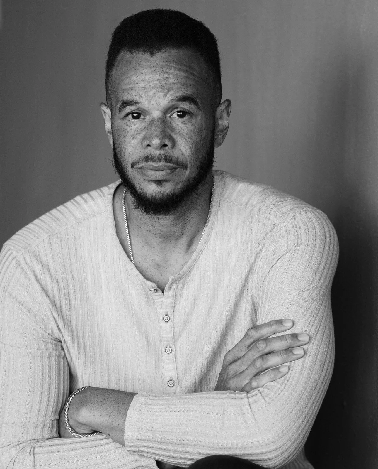 A striking black and white photo of CMJ, he looks super handsome. Photo Credit: Lisa Keating