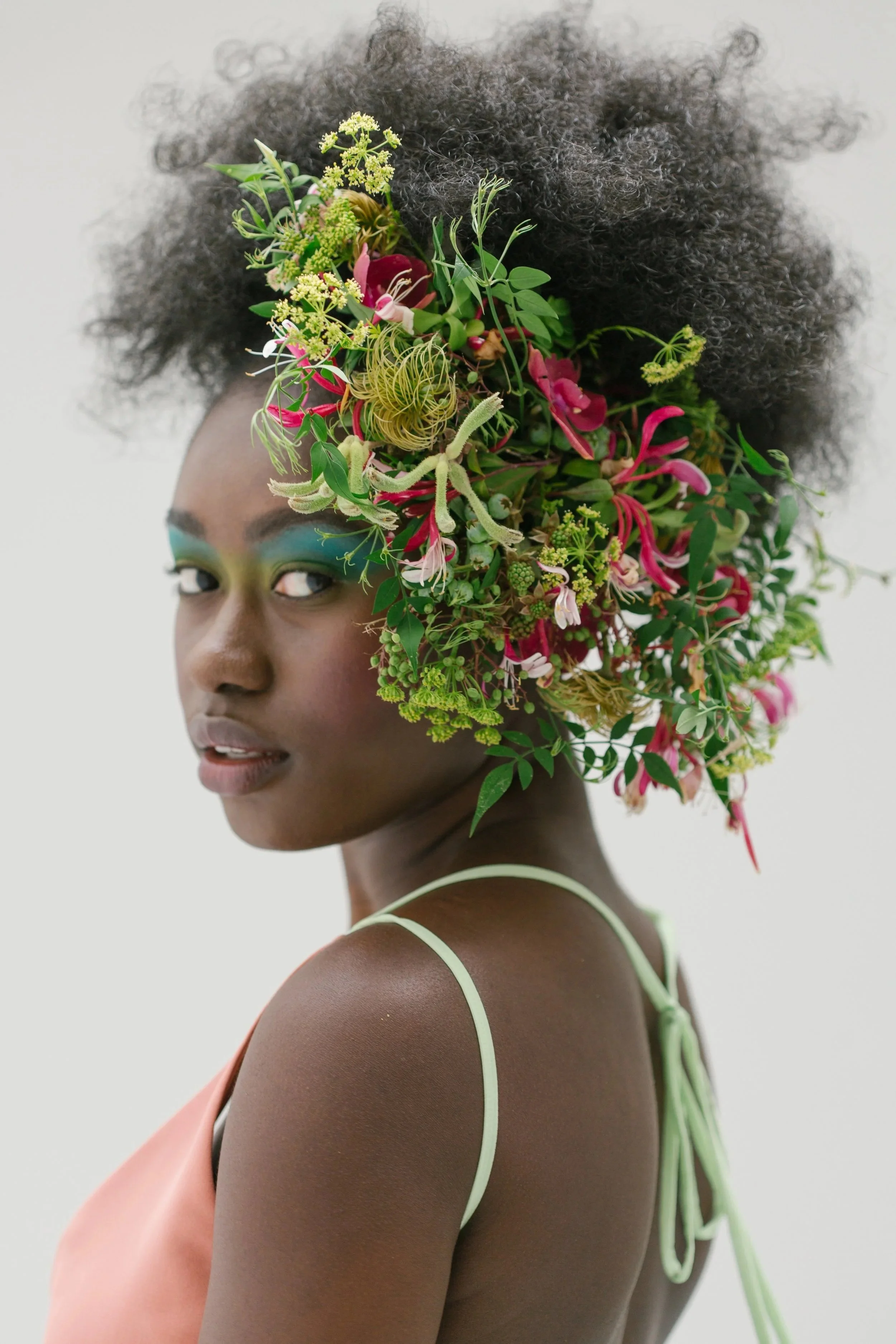 woman wearing botanical head piece Francoise Weeks