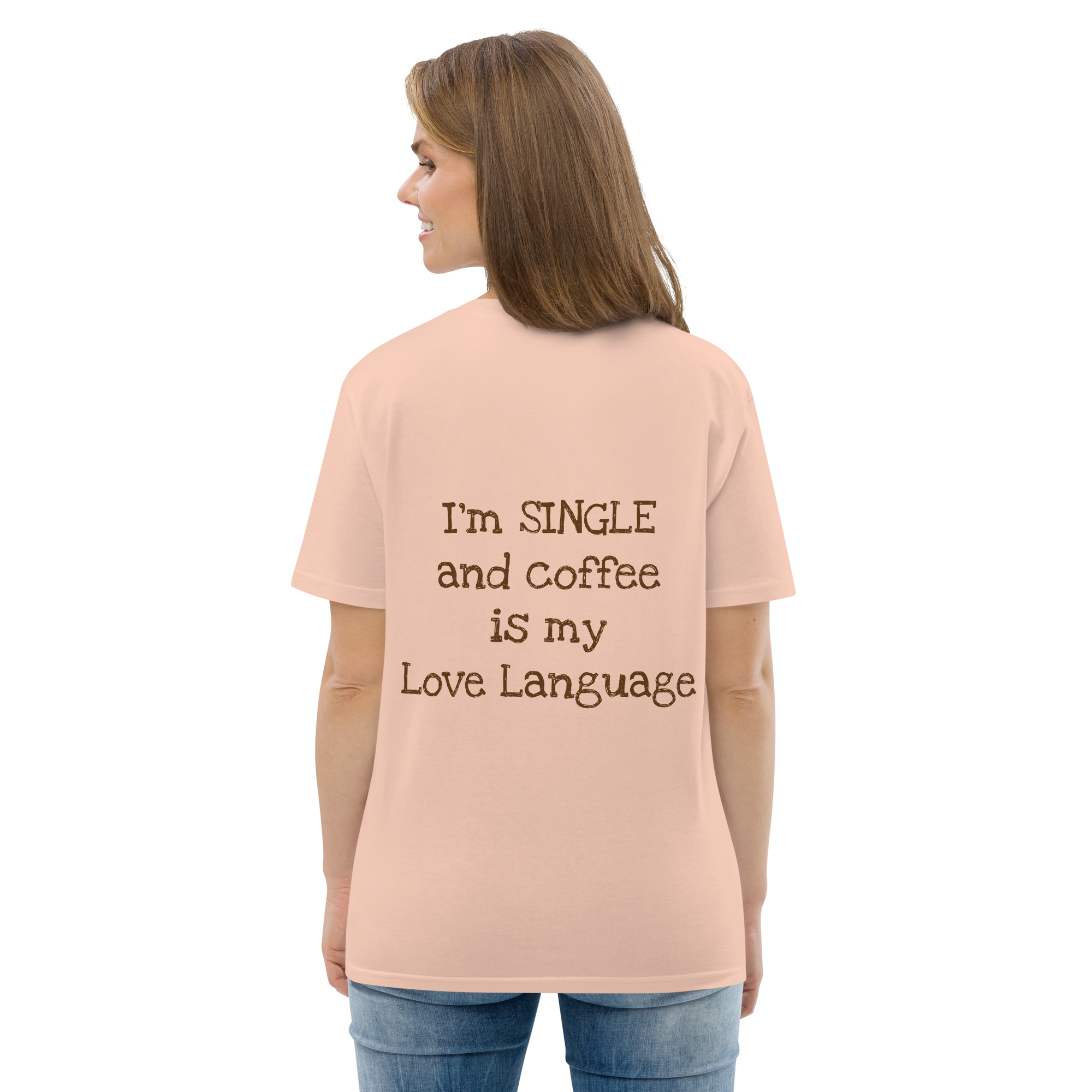 Grab Life Company t-shirt with I'm single and coffee is my Love Language printed on the back in brown on a fraiche peche or peach shirt. Image shows woman wearing the shirt.