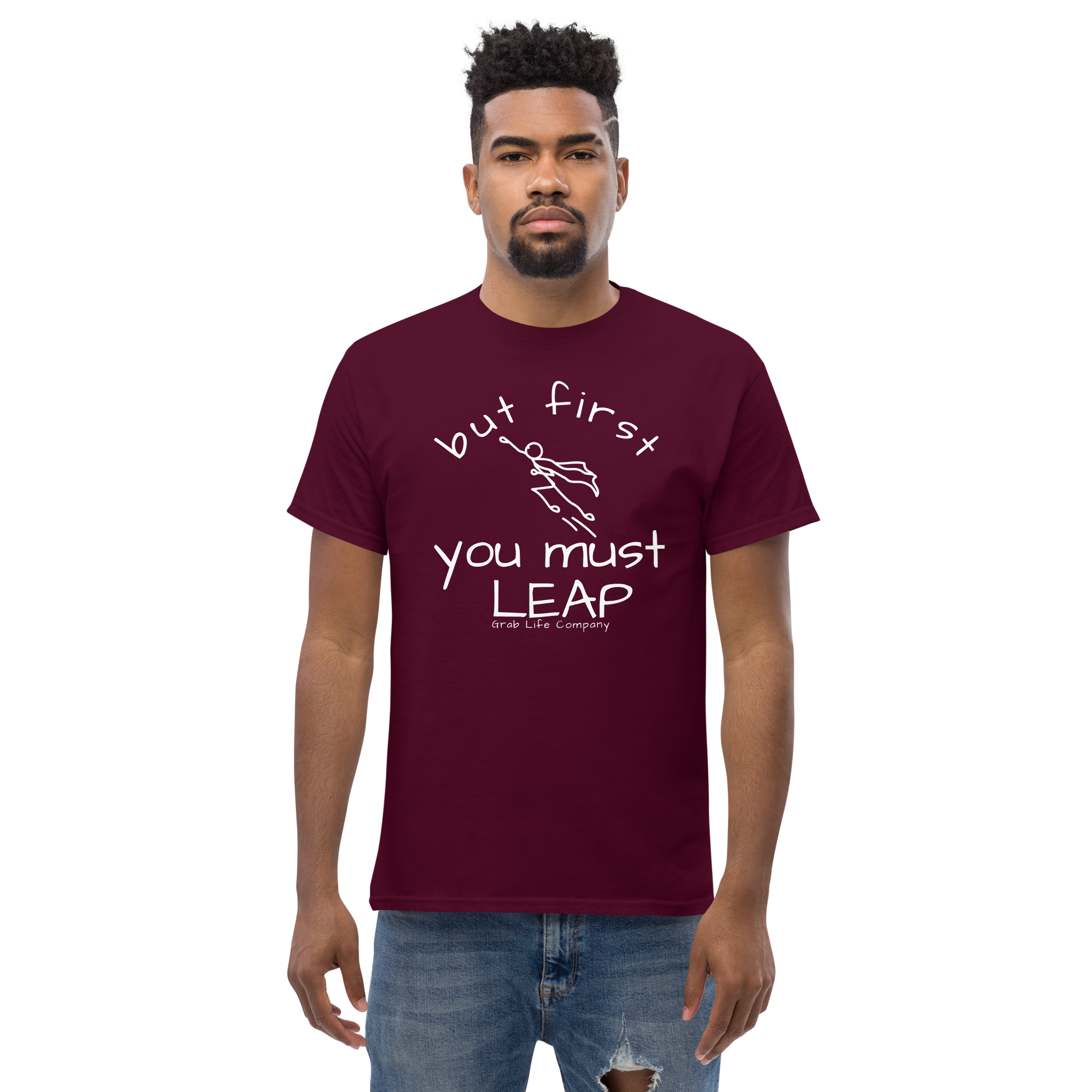 Grab Life Company t-shirt with But First You Must LEAP printed in white on front of maroon shirt. Image shows a man wearing the maroon shirt.