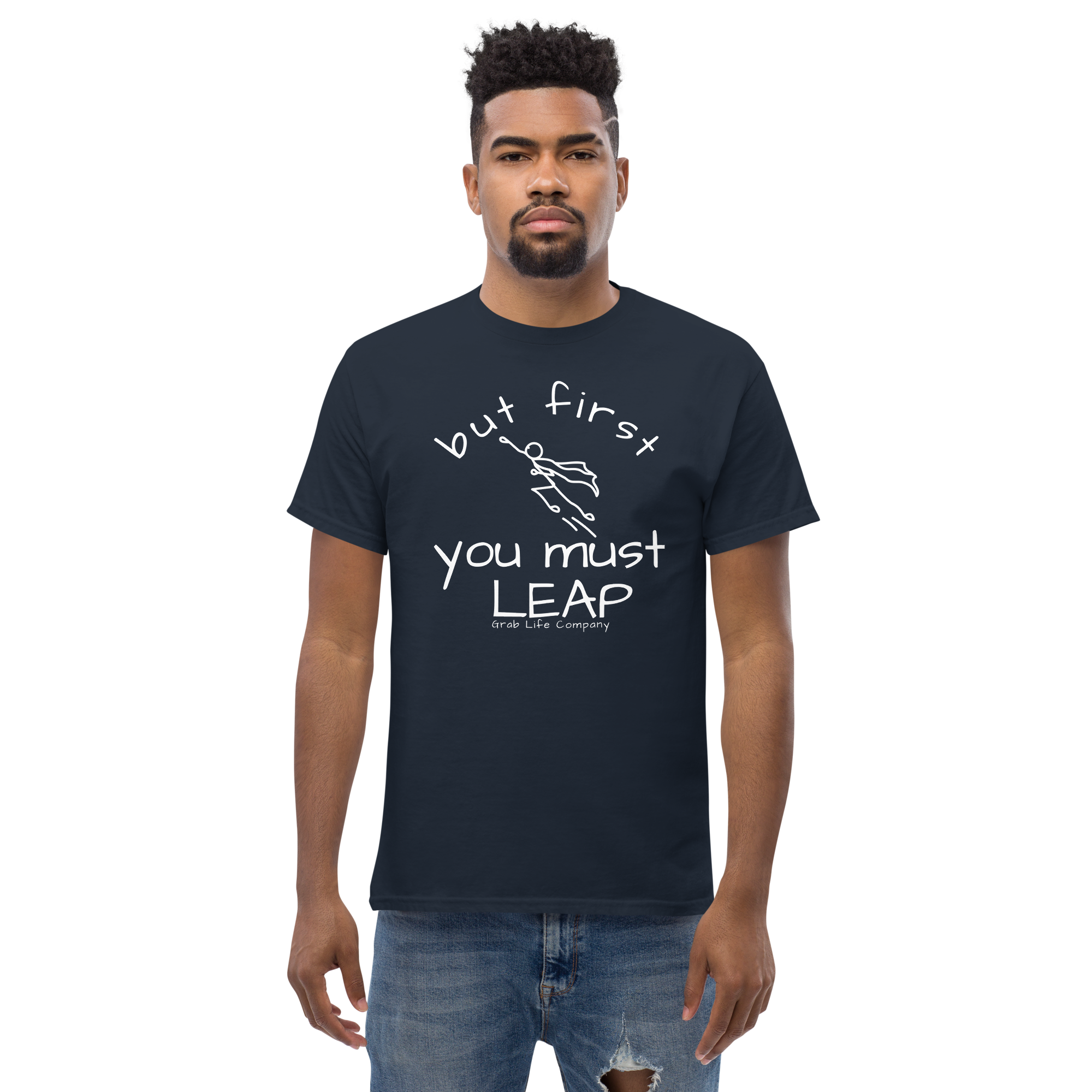 Grab Life Company t-shirt with But First You Must LEAP printed in white on front of navy blue shirt. Image shows a man wearing the navy shirt.