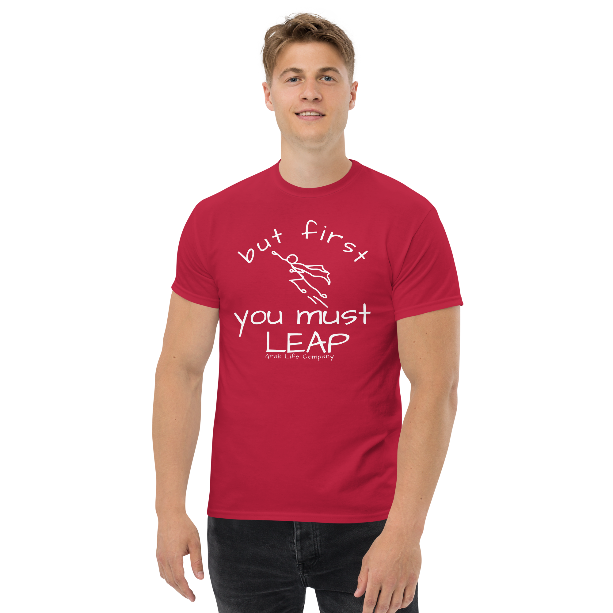 Grab Life Company t-shirt with But First You Must LEAP printed in white on front of cardinal red shirt. Image shows a man wearing the cardinal red shirt.