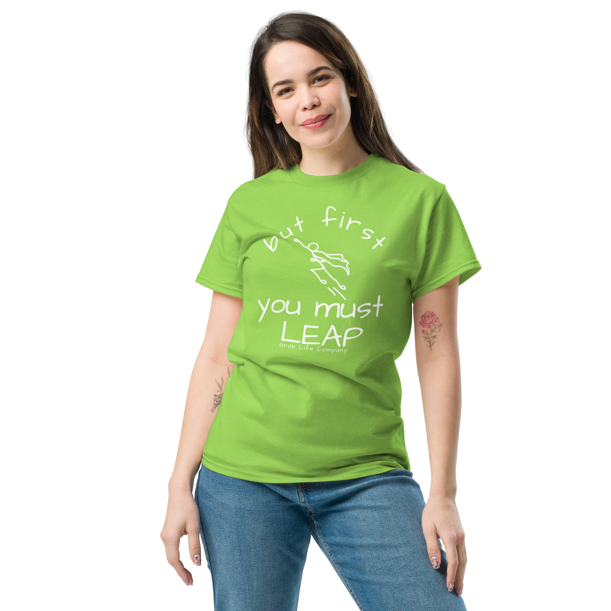 Grab Life Company t-shirt with But First You Must LEAP printed in white on front of lime green shirt. Image shows a woman wearing the lime green shirt.