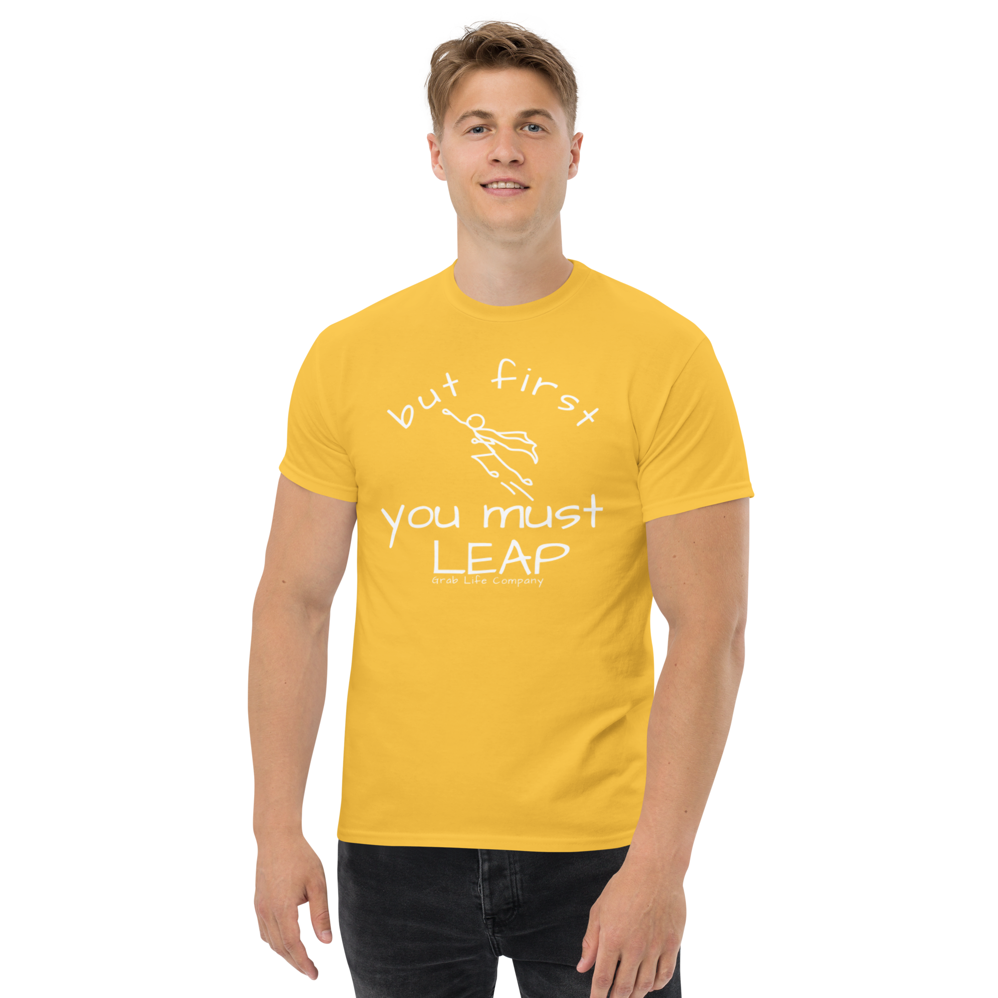 Grab Life Company t-shirt with But First You Must LEAP printed in white on front of daisy yellow shirt. Image shows a man wearing the daisy yellow shirt.