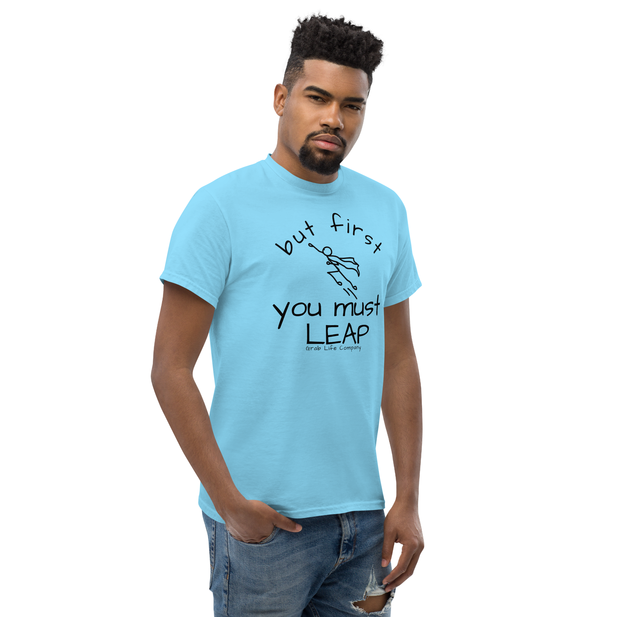 Grab Life Company t-shirt with But First You Must LEAP printed in black on front of sky blue shirt. Image shows a man wearing shirt.