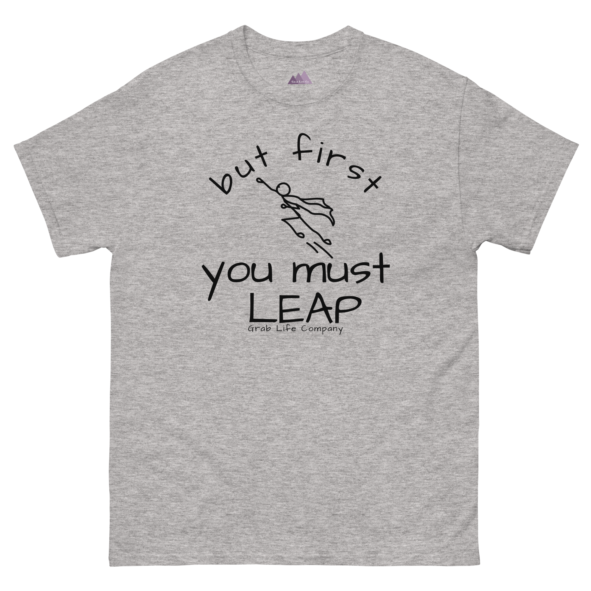 Grab Life Company t-shirt with But First You Must LEAP printed in black on front of sport grey shirt.