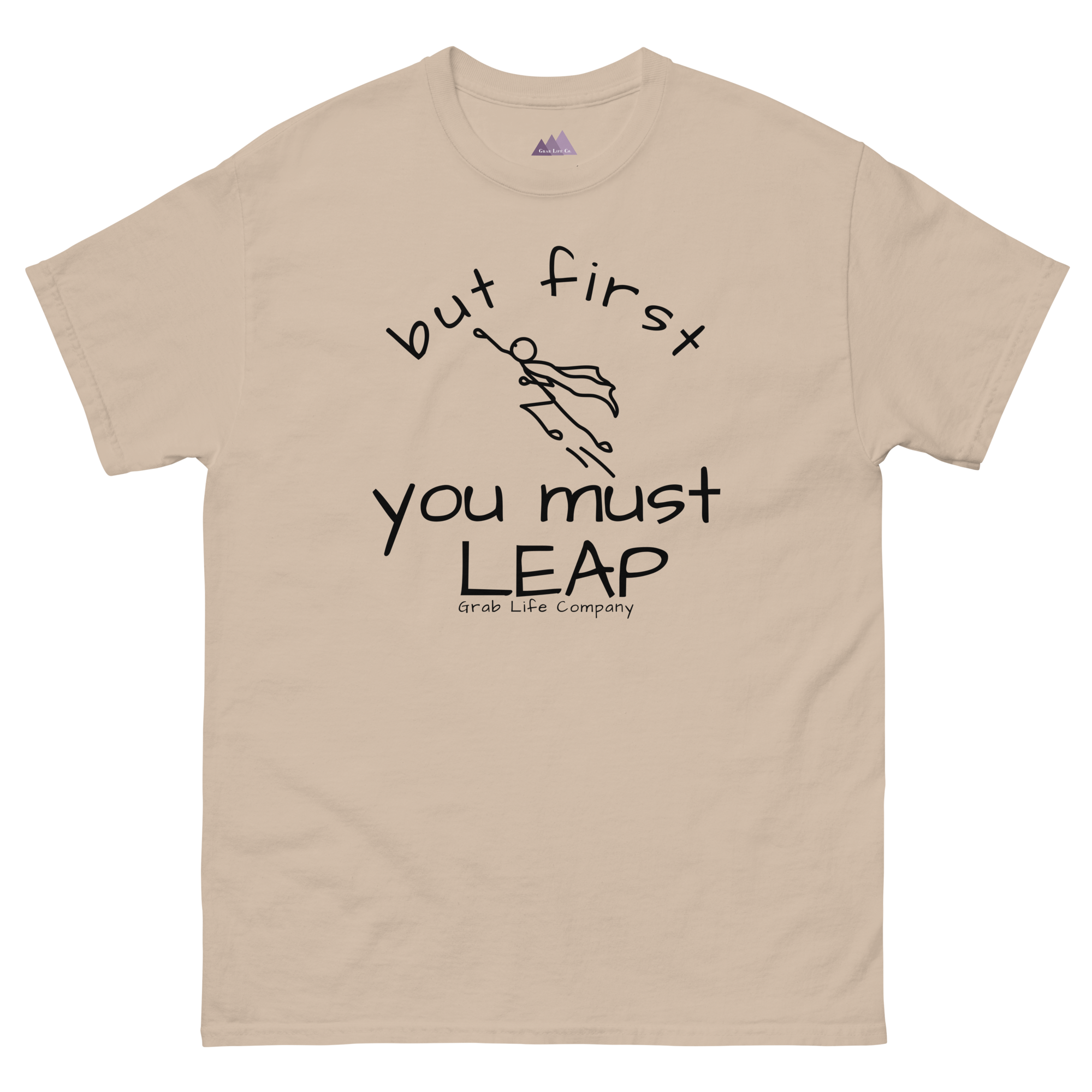 Grab Life Company t-shirt with But First You Must LEAP printed in black on front of sand shirt.