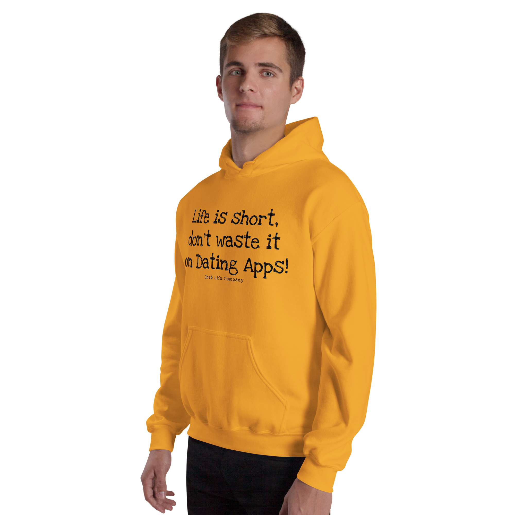 Grab Life Company unisex sweatshirt with Life is Short Don't Waste it on Dating Apps printed in black on Gold yellow hoodie. Image shows man wearing the sweatshirt.