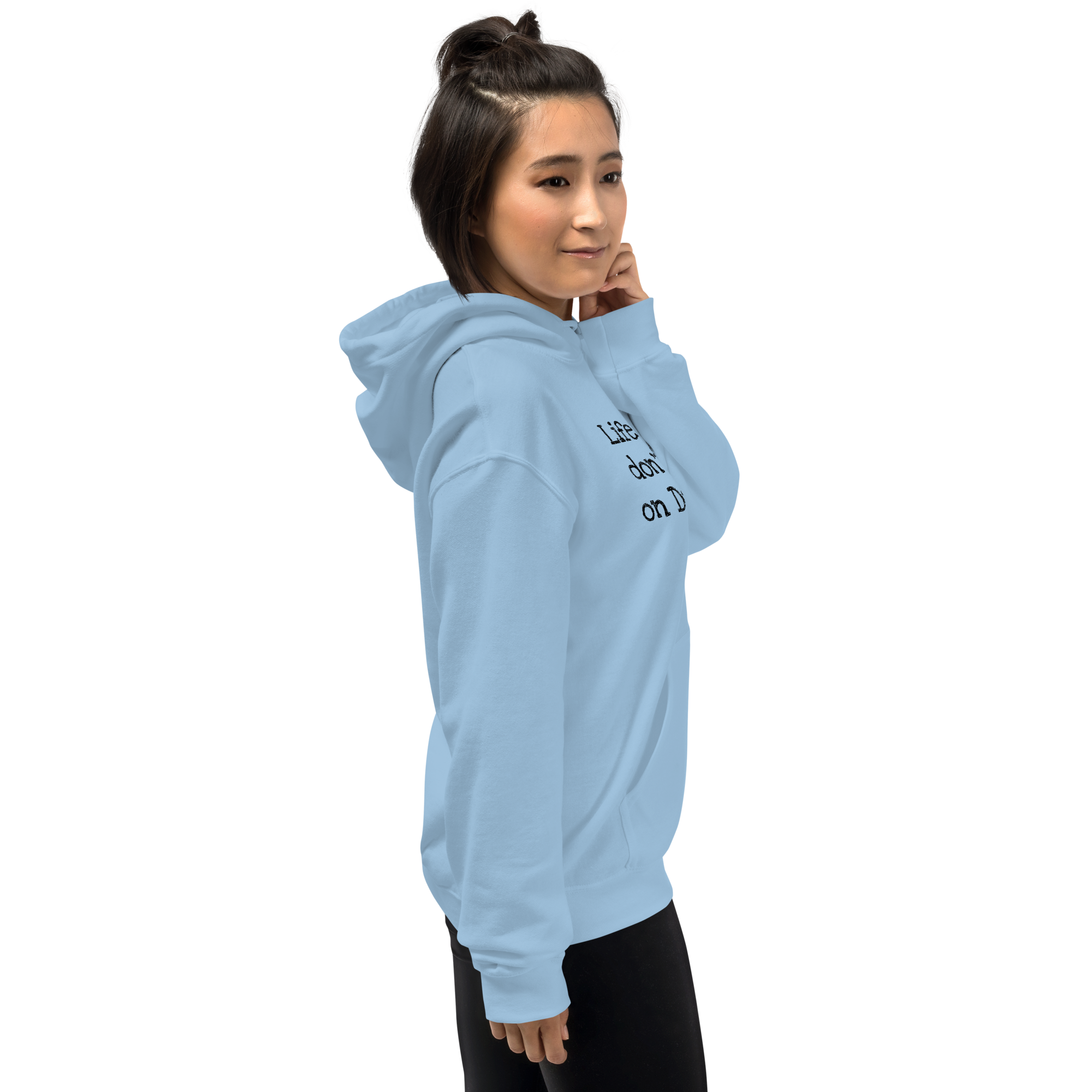 Grab Life Company unisex sweatshirt with Life is Short Don't Waste it on Dating Apps printed in black on light blue hoodie. Image shows woman wearing the sweatshirt.
