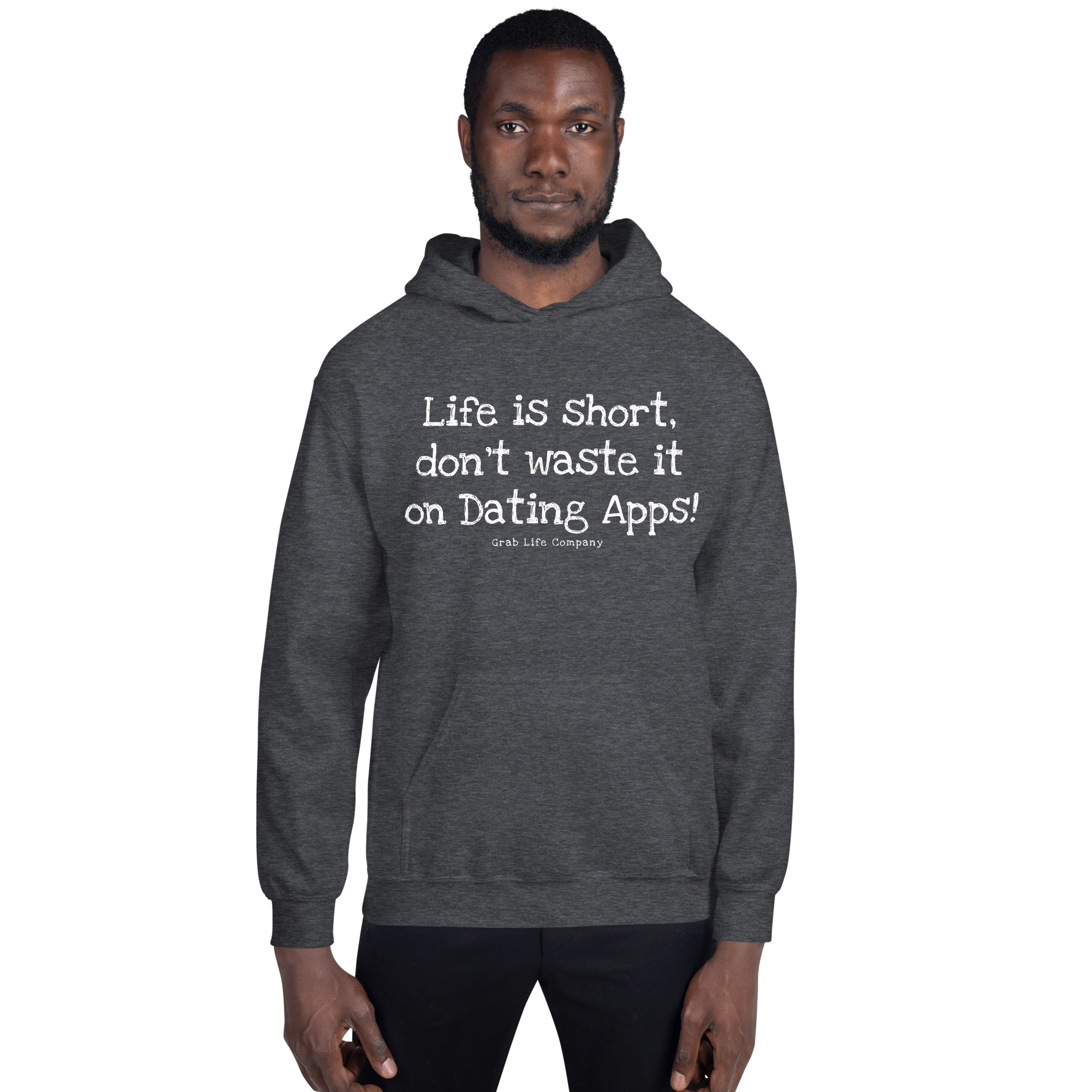 Grab Life Company unisex sweatshirt with Life is Short Don't Waste it on Dating Apps printed in white on dark heather grey hoodie. Image shows man wearing the sweatshirt.