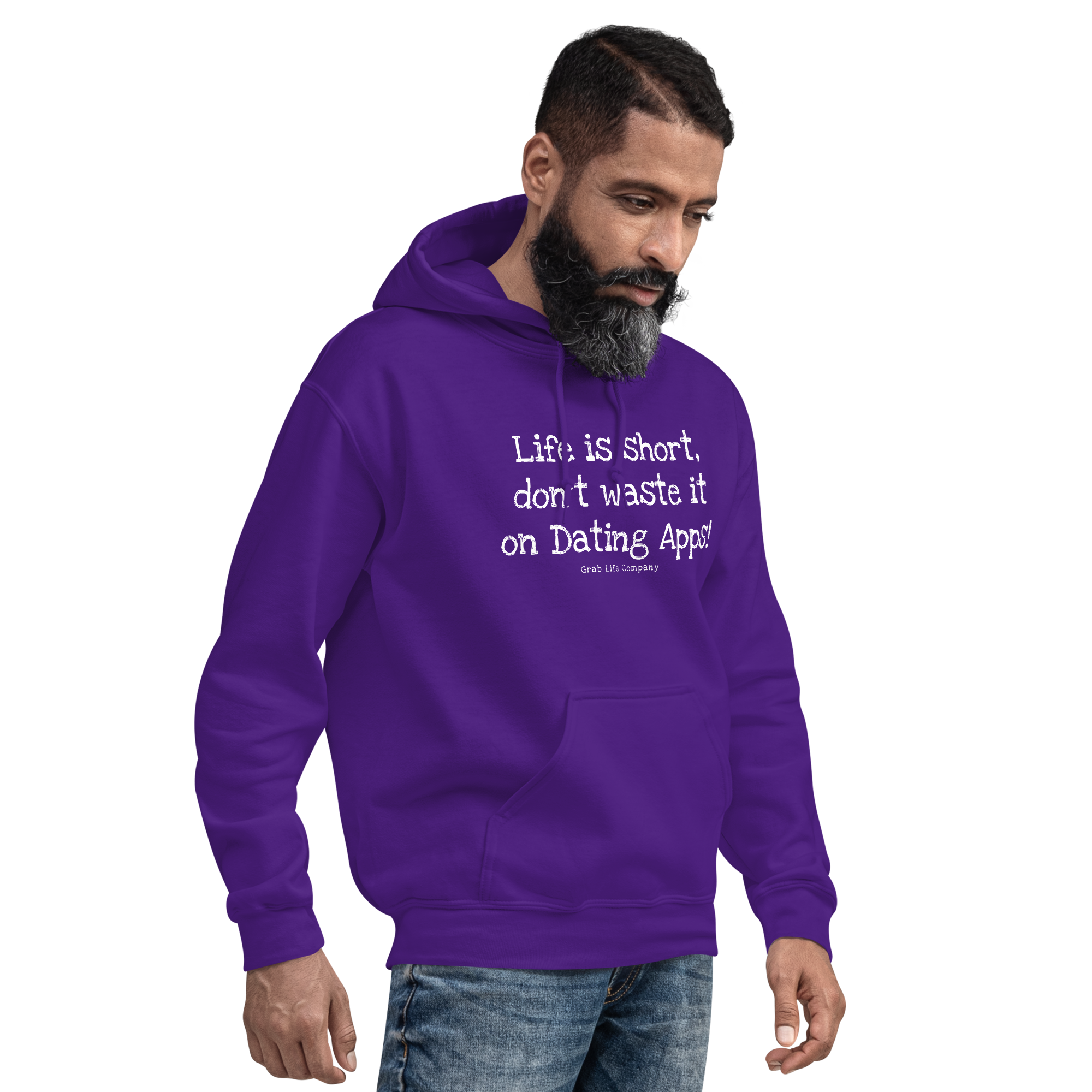 Grab Life Company unisex sweatshirt with Life is Short Don't Waste it on Dating Apps printed in white on purple hoodie. Image shows man wearing the sweatshirt.