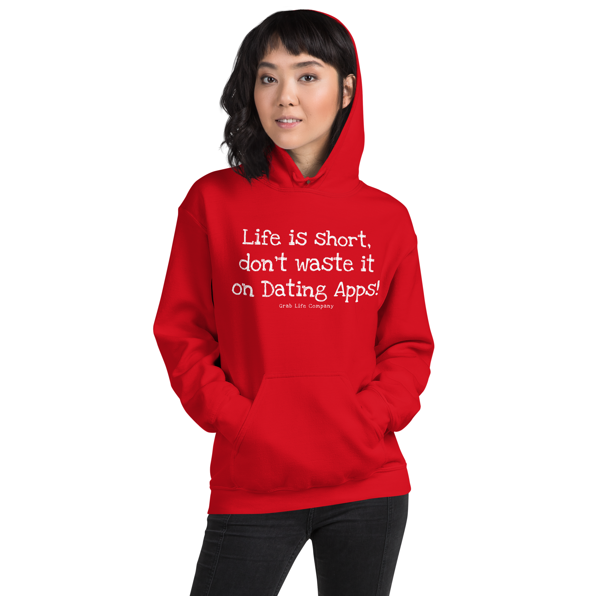 Grab Life Company unisex sweatshirt with Life is Short Don't Waste it on Dating Apps printed in white on red hoodie. Image shows woman wearing the sweatshirt.