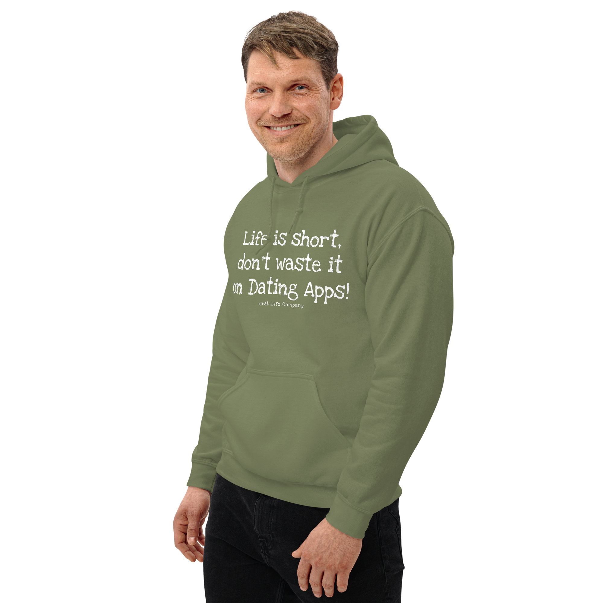 Grab Life Company unisex sweatshirt with Life is Short Don't Waste it on Dating Apps printed in white on military green hoodie. Image shows man wearing the sweatshirt.