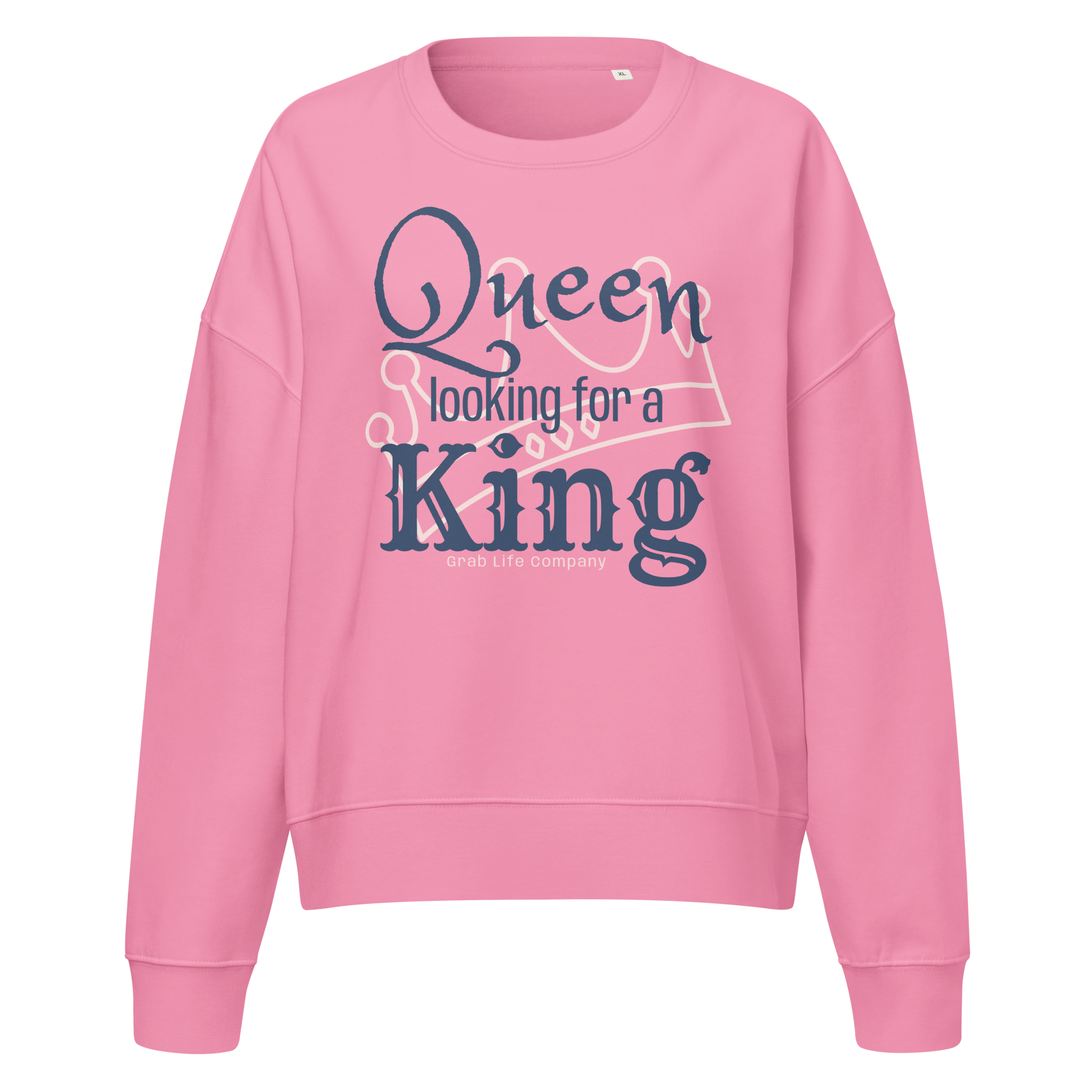 Grab Life Company women's crew neck sweatshirt with Queen Looking for a King printed in navy blue on a bubble pink sweatshirt.