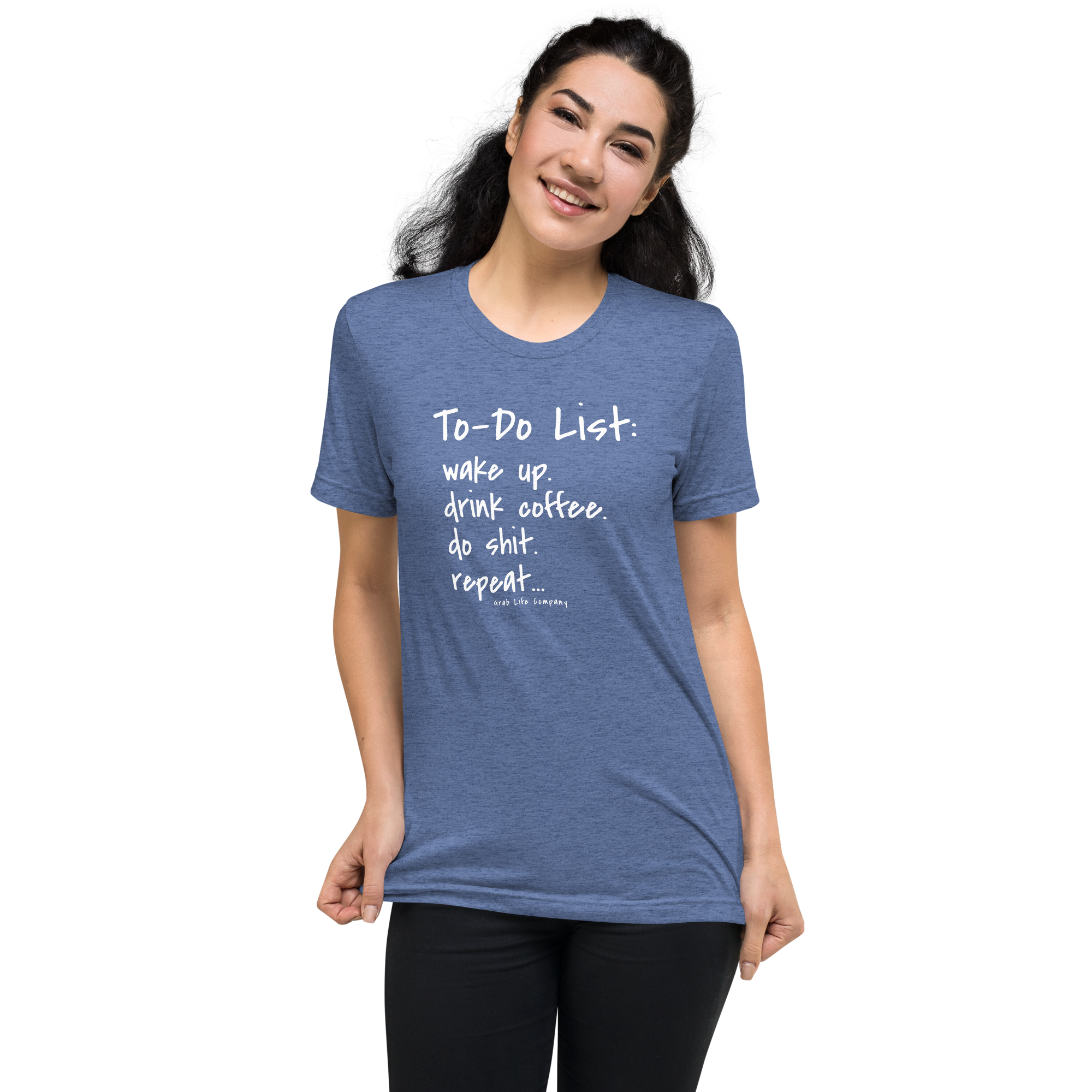 Grab Life Company unisex t-shirt with To-Do List: wake up. drink coffee. do shit. repeat. written on the front in white on a blue triblend tee. Image shows a woman wearing the shirt.
