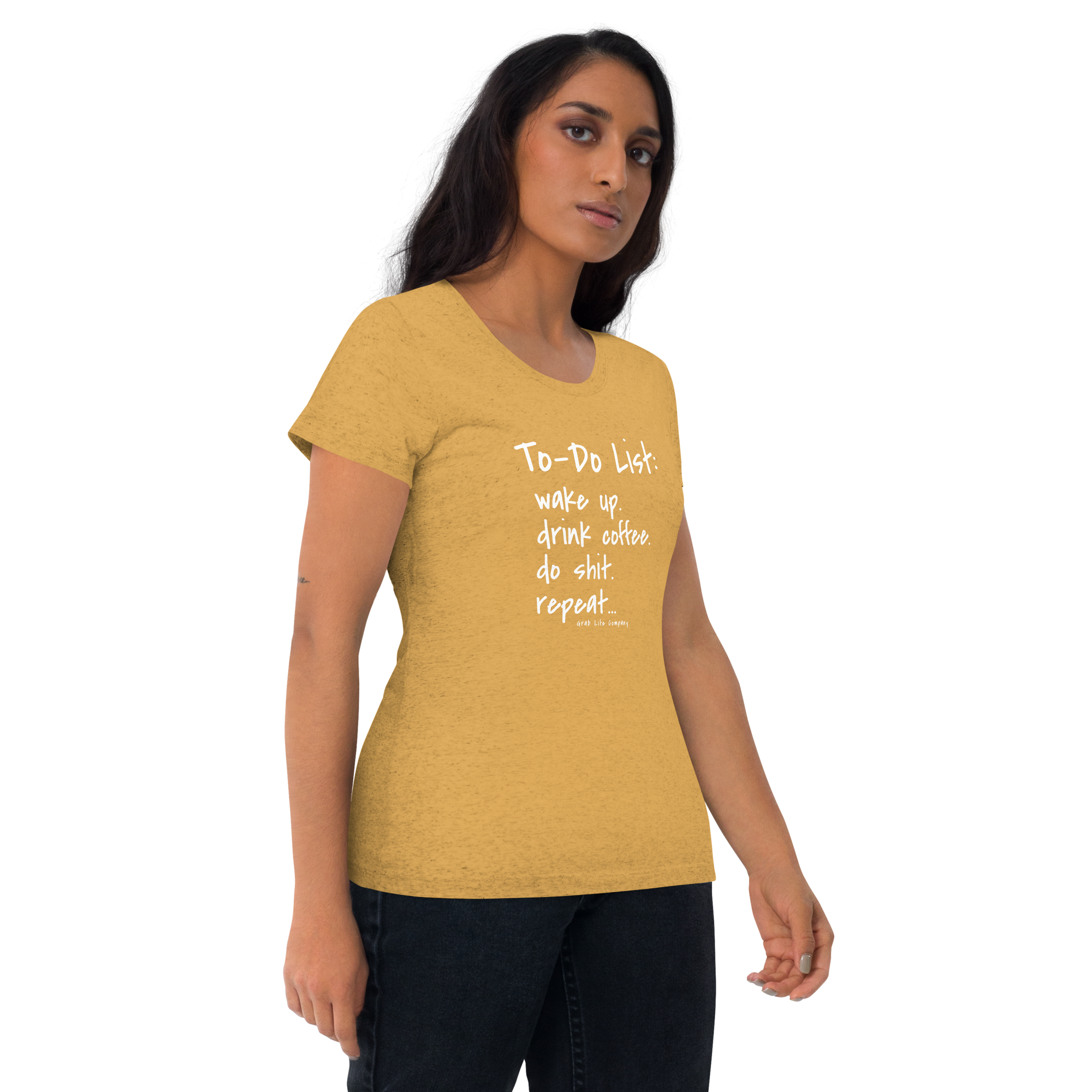 Grab Life Company unisex t-shirt with To-Do List: wake up. drink coffee. do shit. repeat. written on the front in white on a mustard triblend tee. Image shows a woman wearing the shirt.