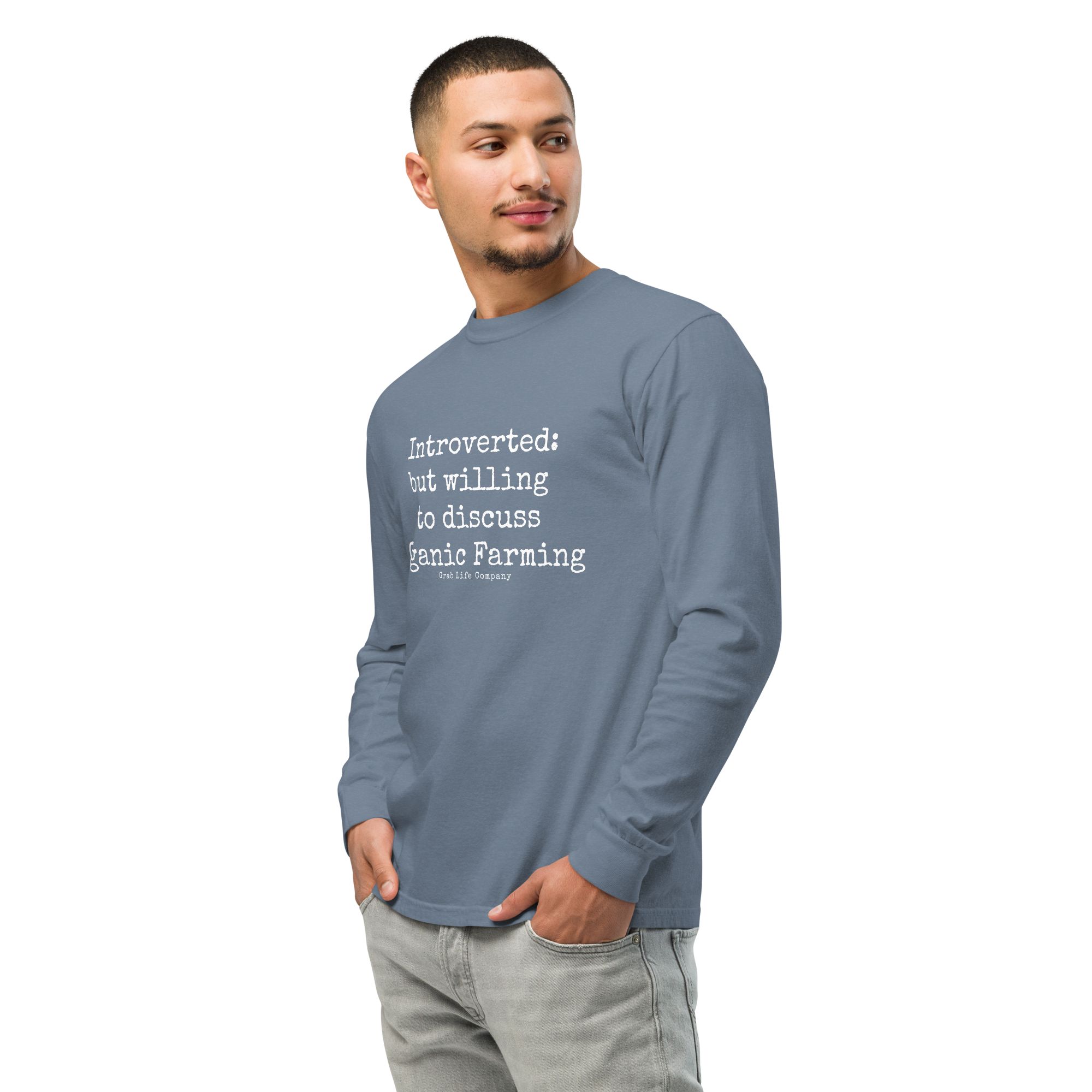 Grab Life Company unisex long-sleeve tee with Introverted: but willing to discuss organic farming written in white on the front of a blue jean colored shirt. Image shows man wearing the shirt.