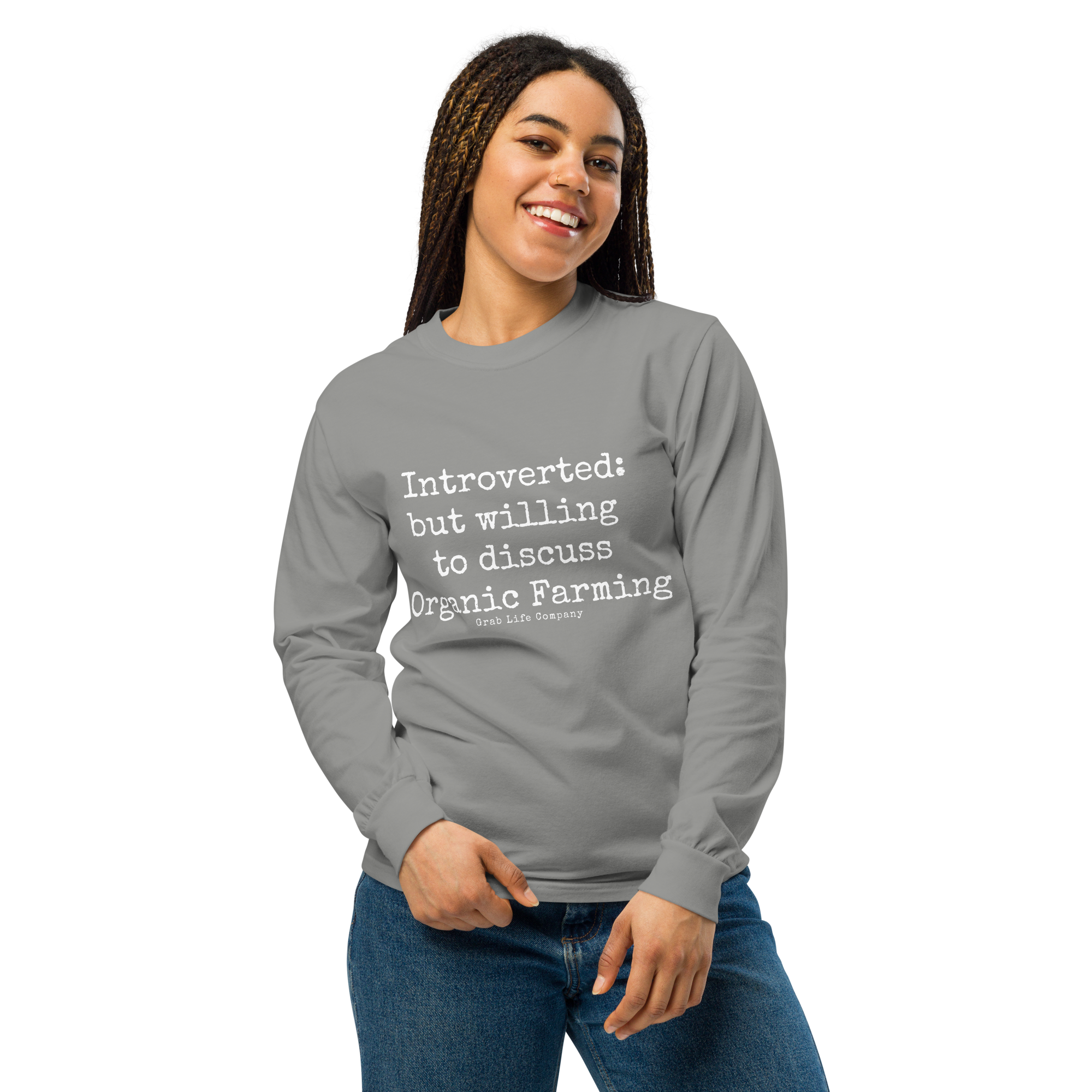 Grab Life Company unisex long-sleeve tee with Introverted: but willing to discuss organic farming written in white on the front of a grey shirt. Image shows woman wearing the shirt.