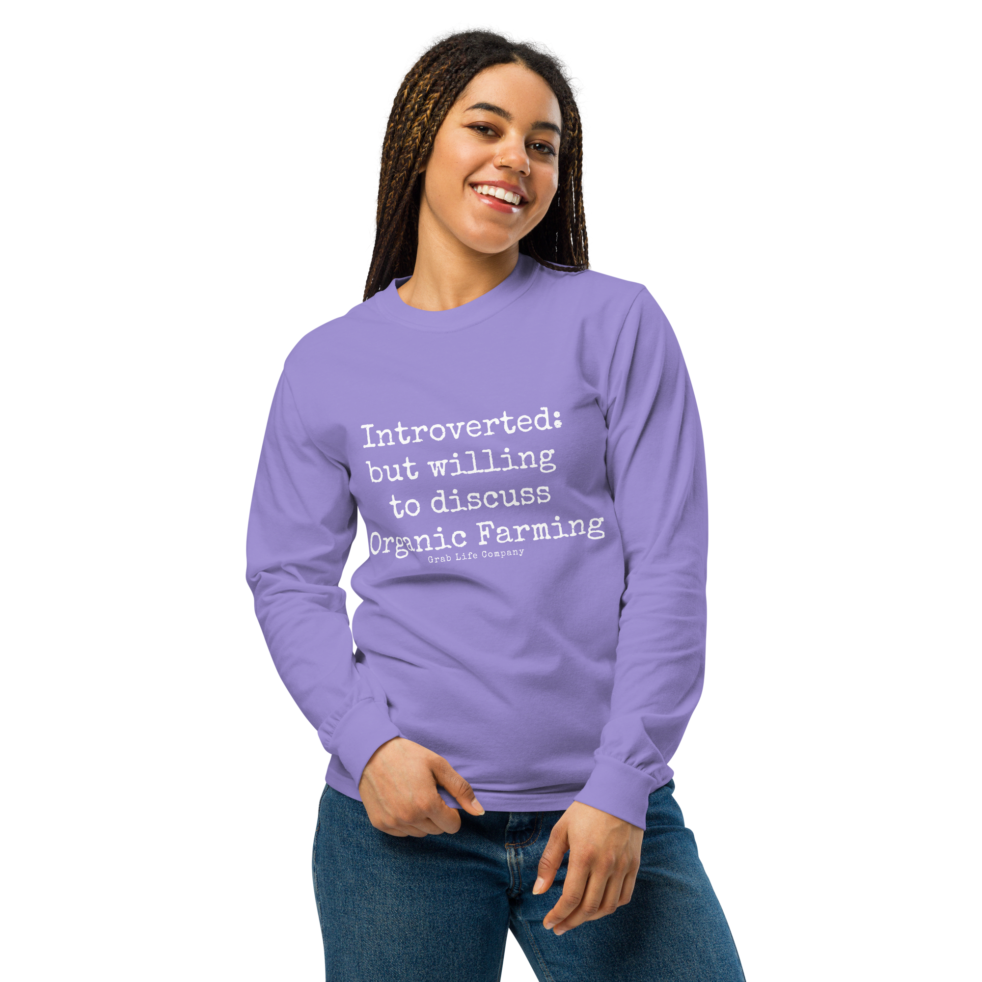 Grab Life Company unisex long-sleeve tee with Introverted: but willing to discuss organic farming written in white on the front of a violet shirt. Image shows woman wearing the shirt.