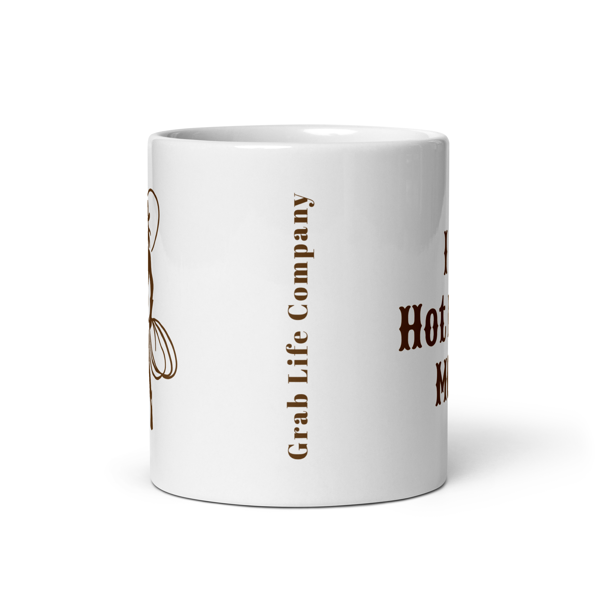 Grab Life Company 11 oz. white mug printed with I heart hot rodeo moms in brown on one side and a silhouette of a cowgirl roping on the other side.