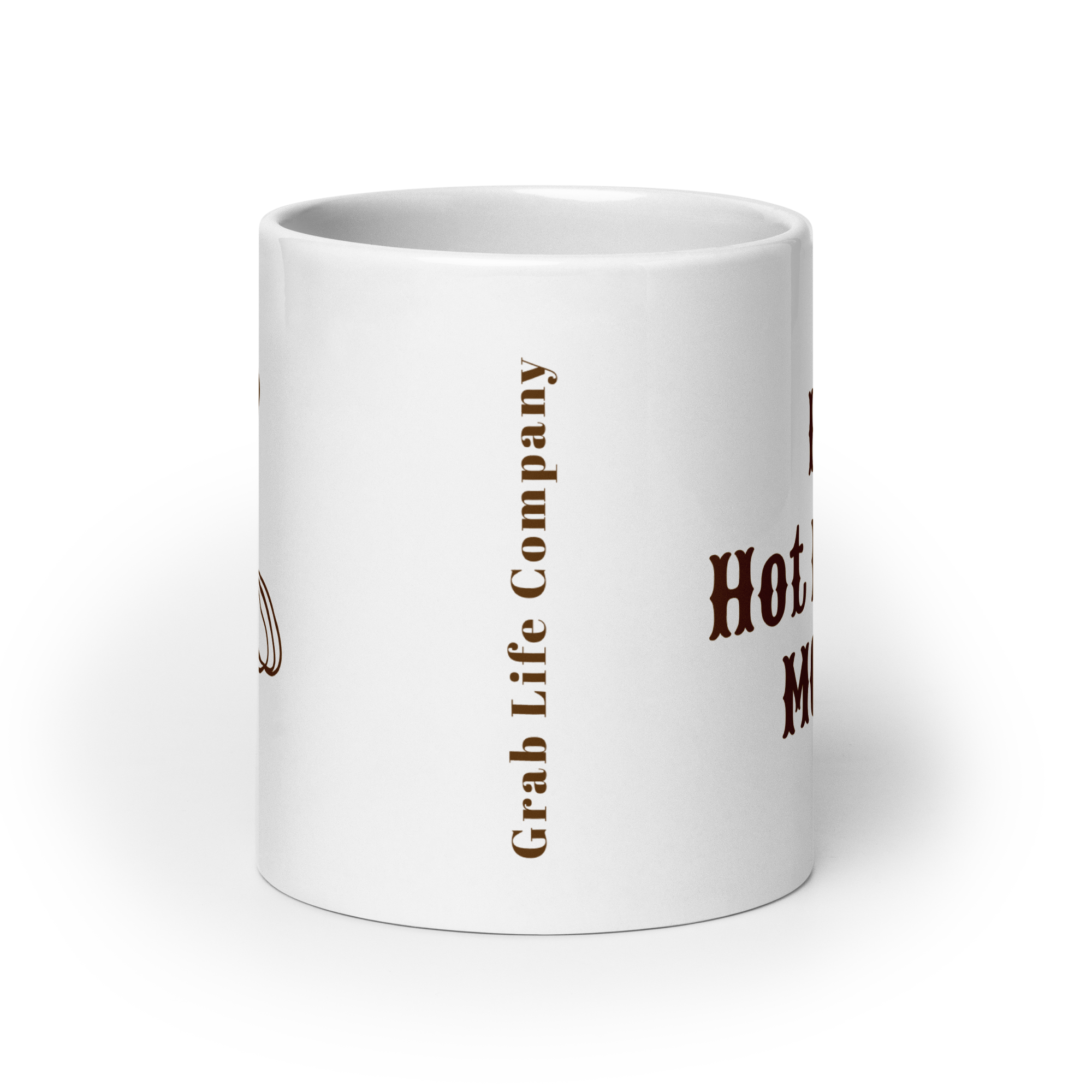 Grab Life Company 20 oz. white mug printed with I heart hot rodeo moms in brown on one side and a silhouette of a cowgirl roping on the other side.
