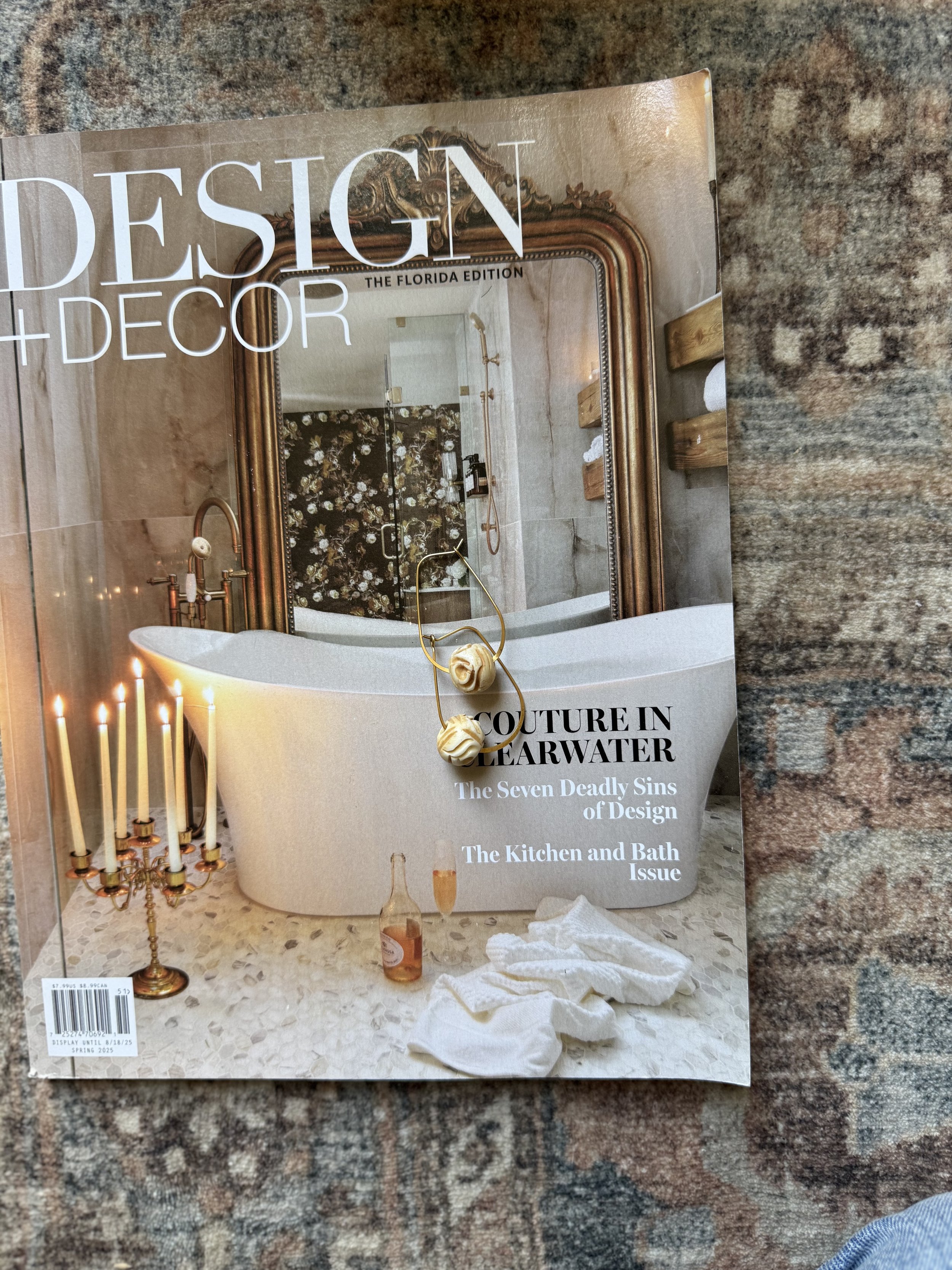 Gold drop earrings with a minimal, delicate design.