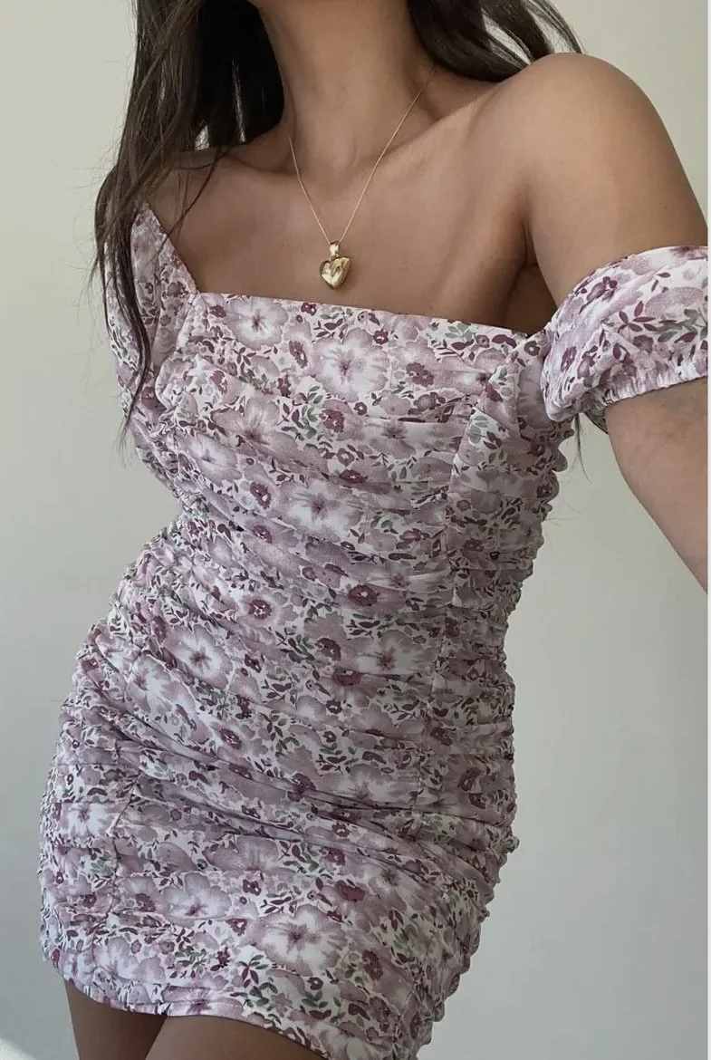 Floral off-the-shoulder dress with ruched bodice detail.