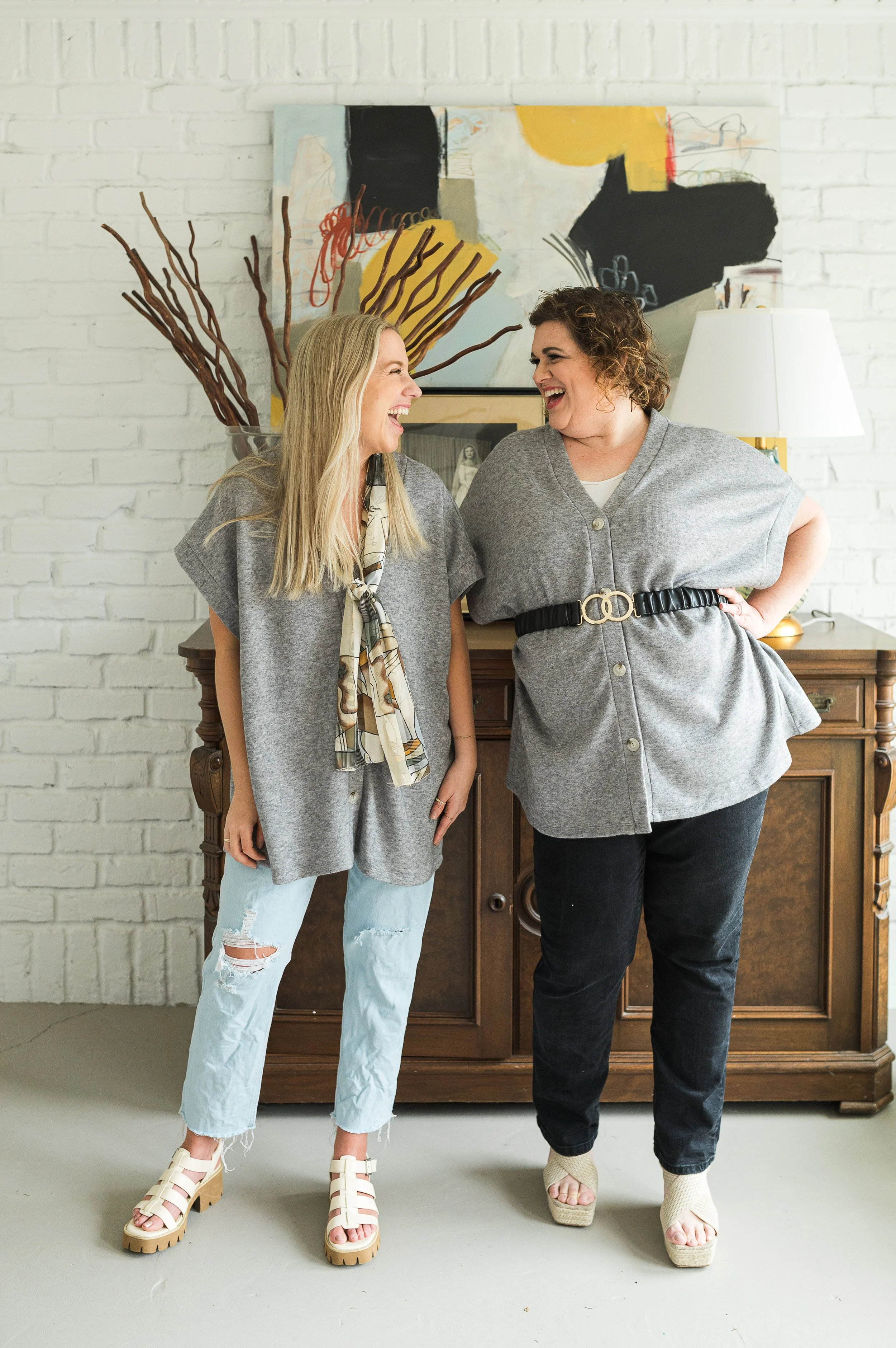 Gray sleeveless vest with a relaxed silhouette.