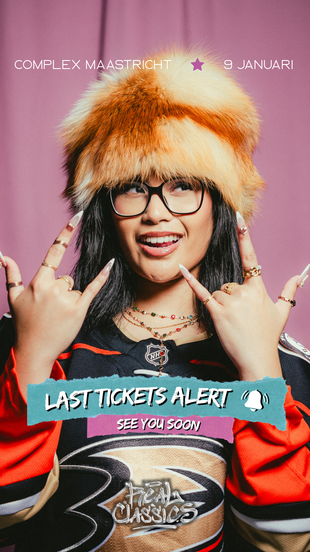 A woman with long black hair, glasses, and multiple necklaces is wearing a furry hat and a hockey jersey. She is making a rock and roll hand gesture and smiling. The image includes text that says 'Last Tickets Alert, See You Soon' and 'Real Classics'.