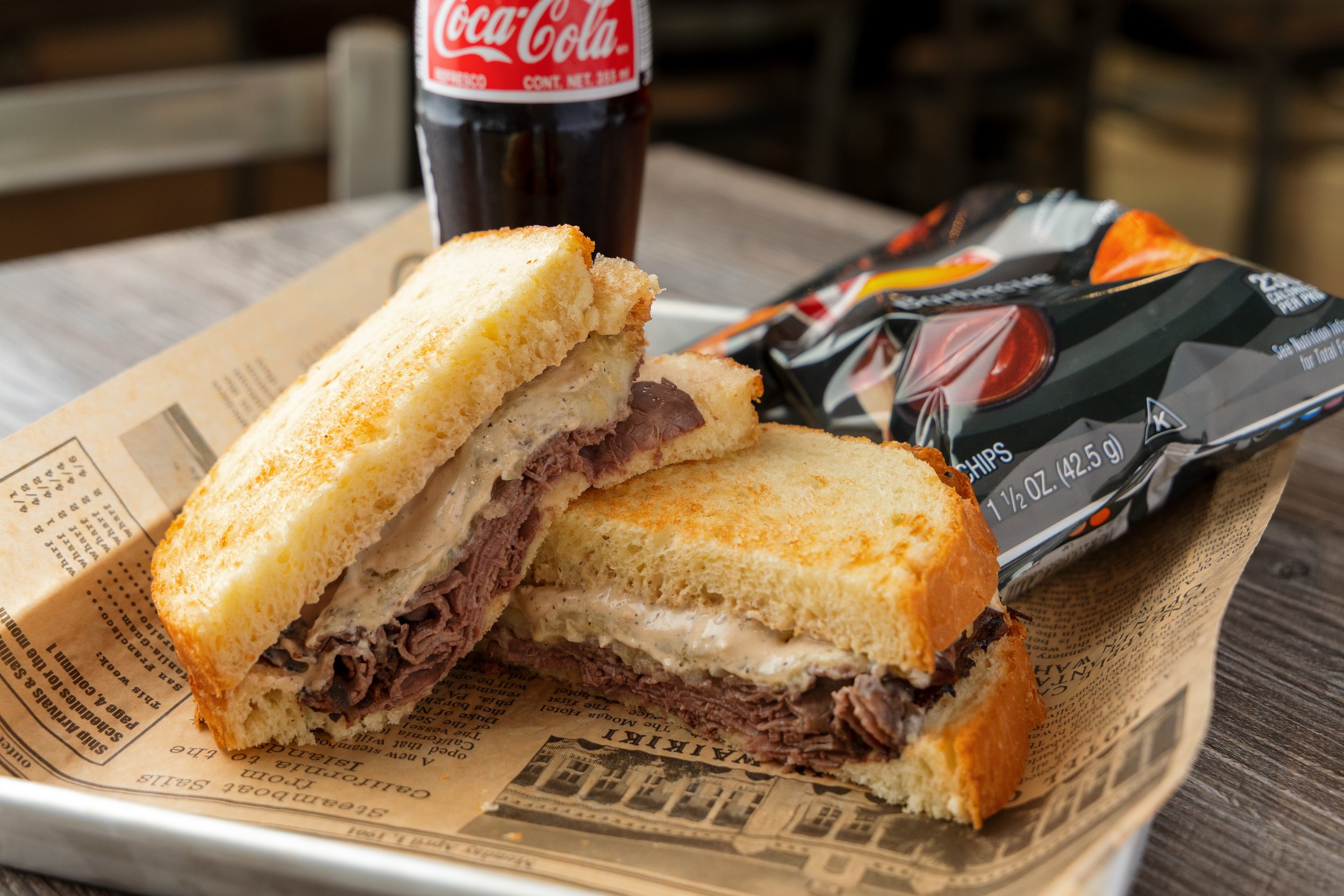 Sandwich, chips, and soda