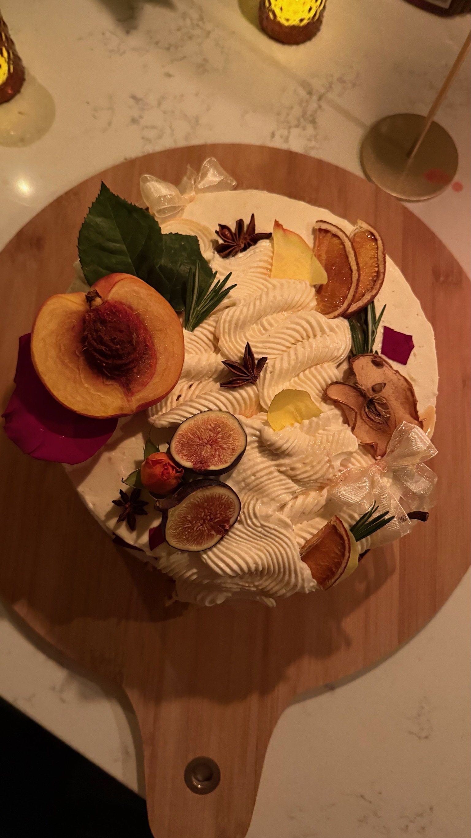 Premium Custom Birthday cake, 8 inches
Caramel cake with maple cream cheese filling and cream cheese buttercream icing. 
Rustic piping style, decorated with fresh fruit and flowers. 
Serves 12-24. 