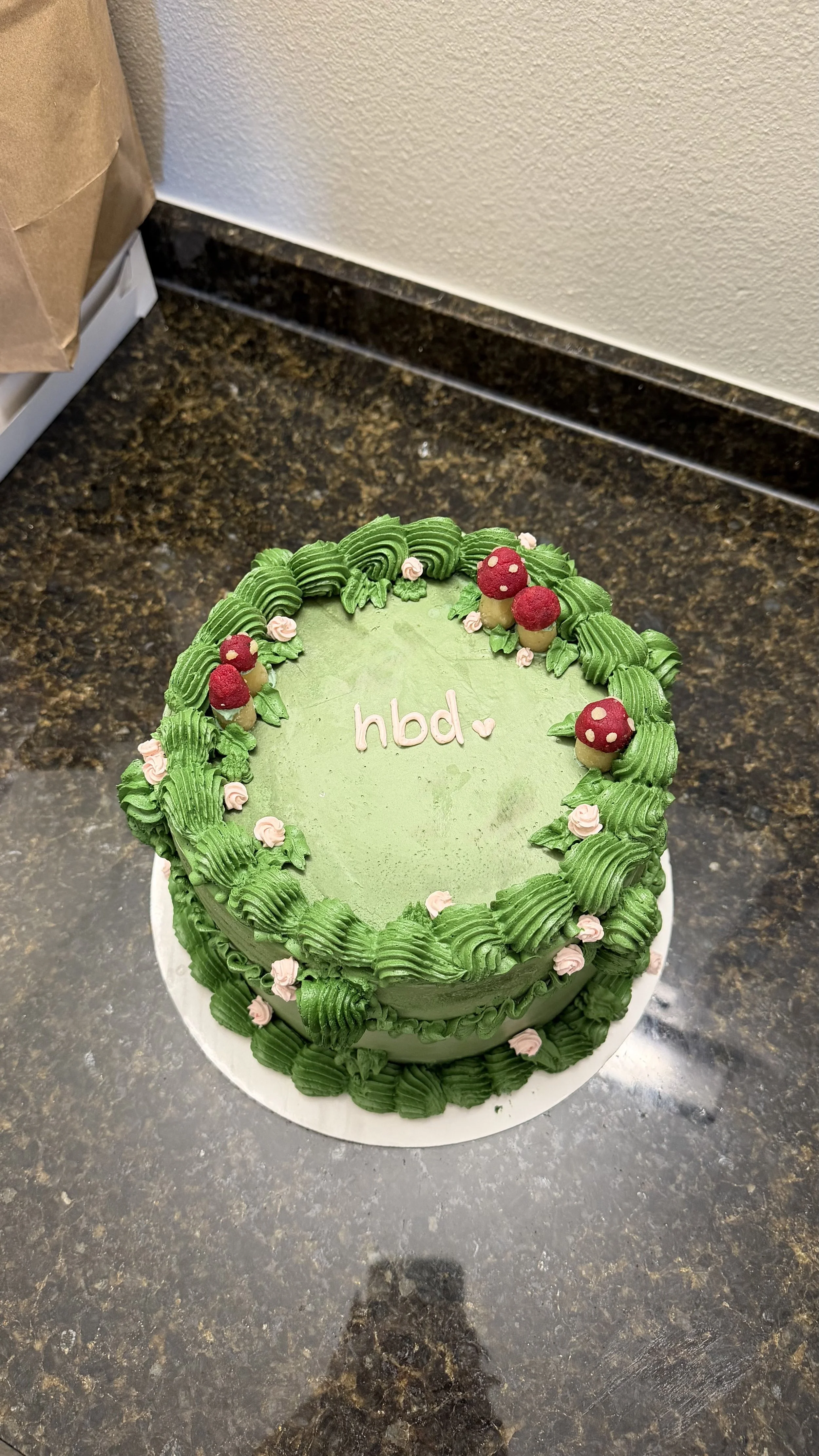 Custom birthday cake, 8 inch round
Red velvet cake with fresh cream cheese filling and SMBC icing. Vintage piping style. Marzipan edible mushrooms.
Serves 12-22.