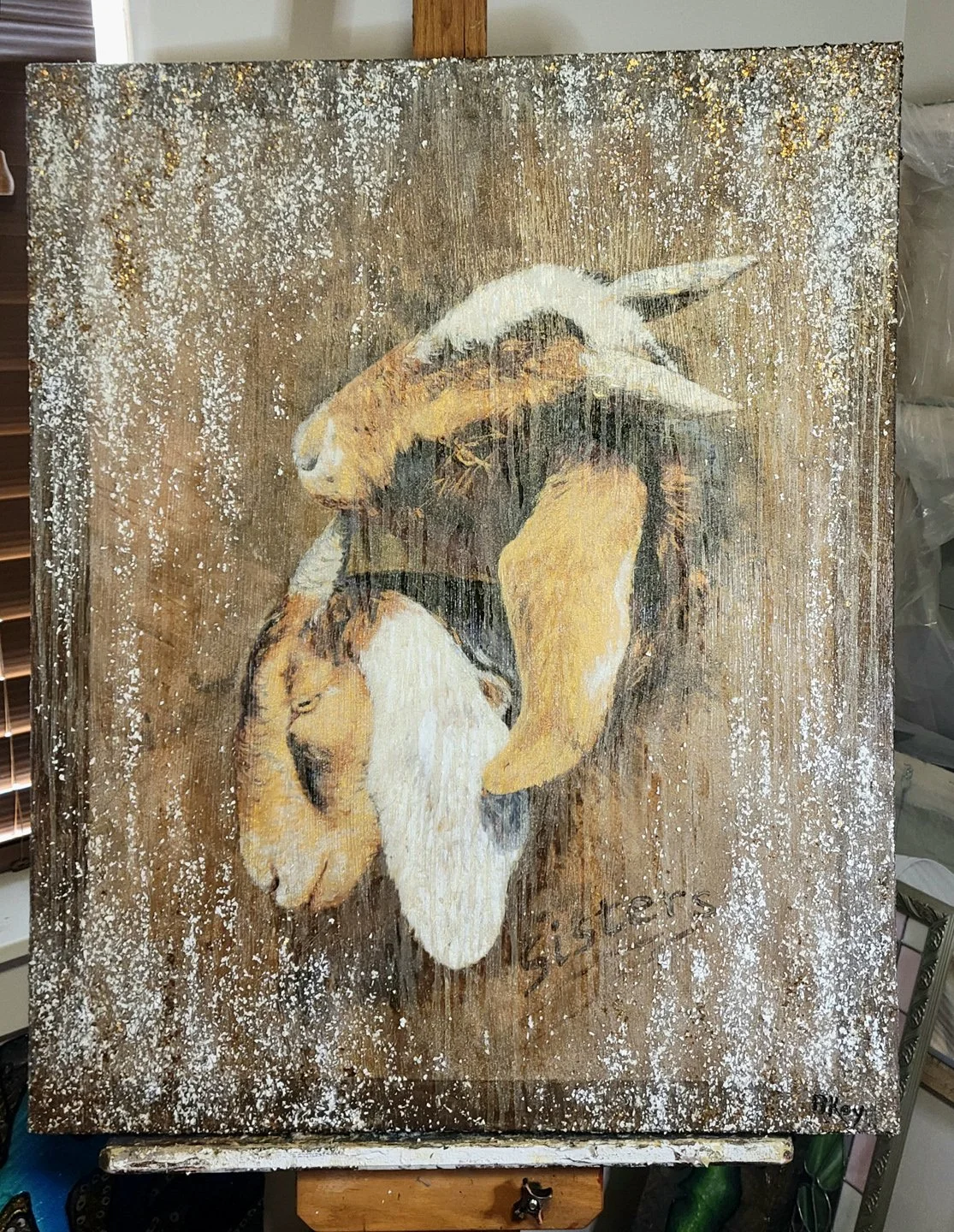 A painting of a lion's head with bananas surrounding it, created on a wooden canvas with a weathered look.