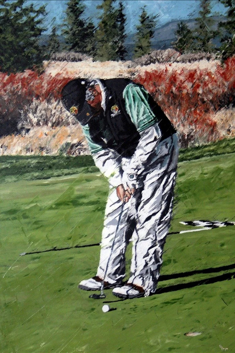 A person in golf attire is preparing to hit a golf ball on a green course, with trees and foliage in the background.