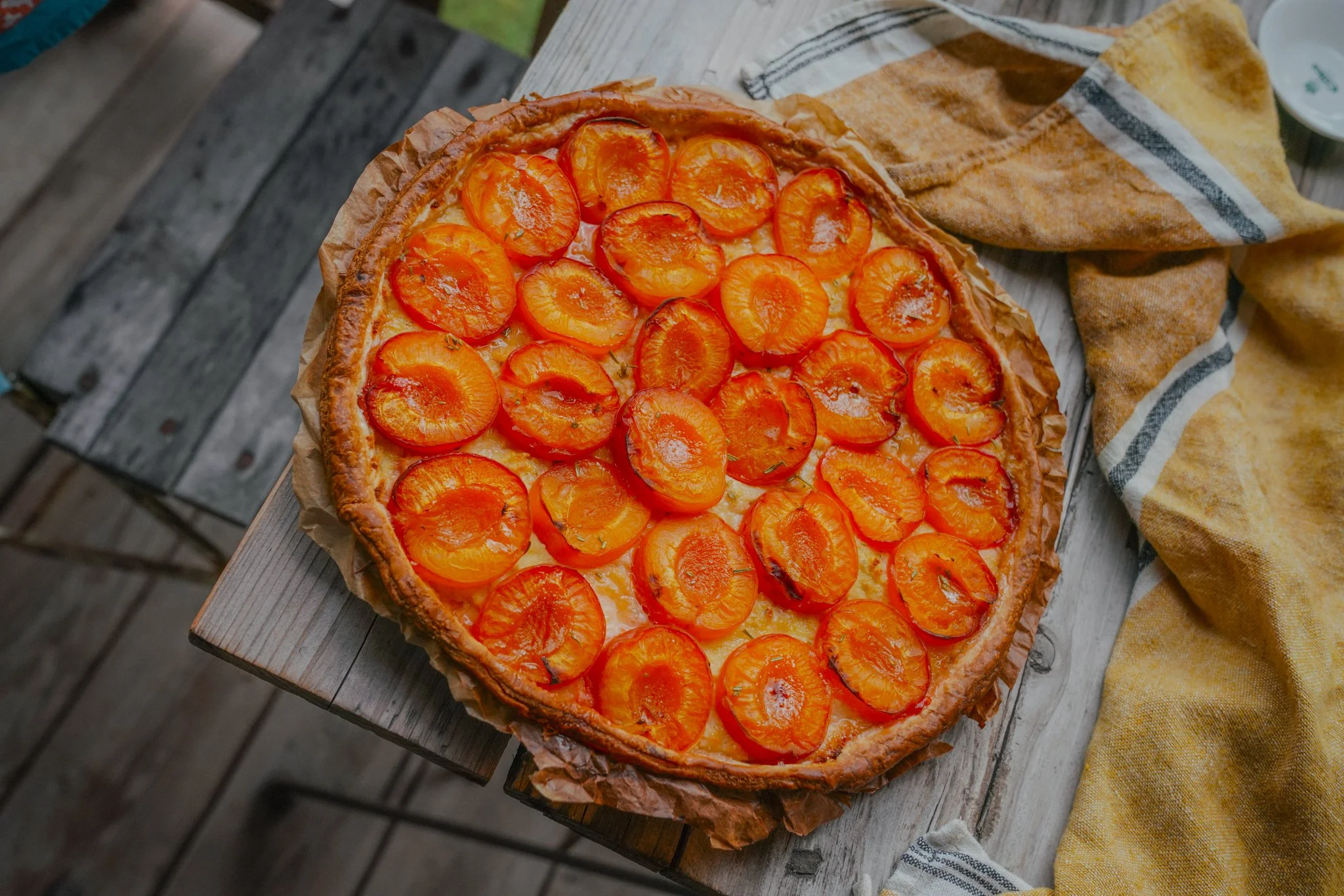 Apricot tart on wooden table