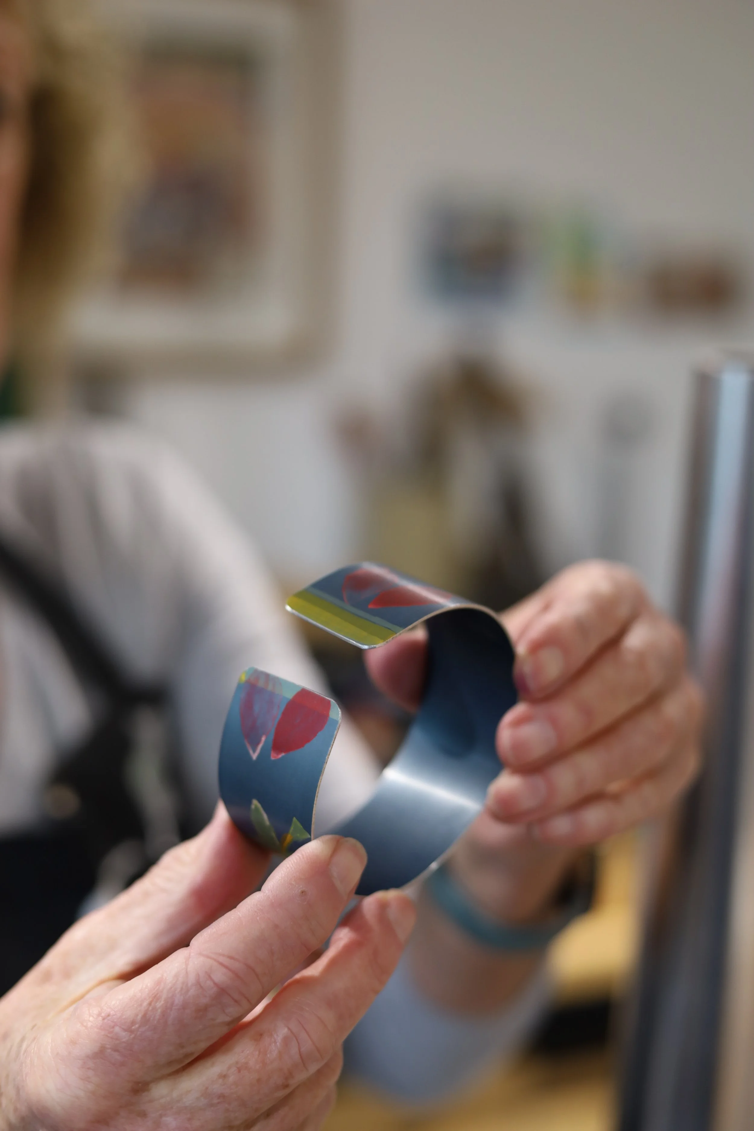 Aluminium jewellery workshop, student making a bangle.