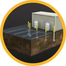 Model of a parking lot with various yellow bollards and a building in the background