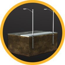 A rectangular concrete fountain with two vertical water jets against a dark background, bordered by a yellow circular frame.