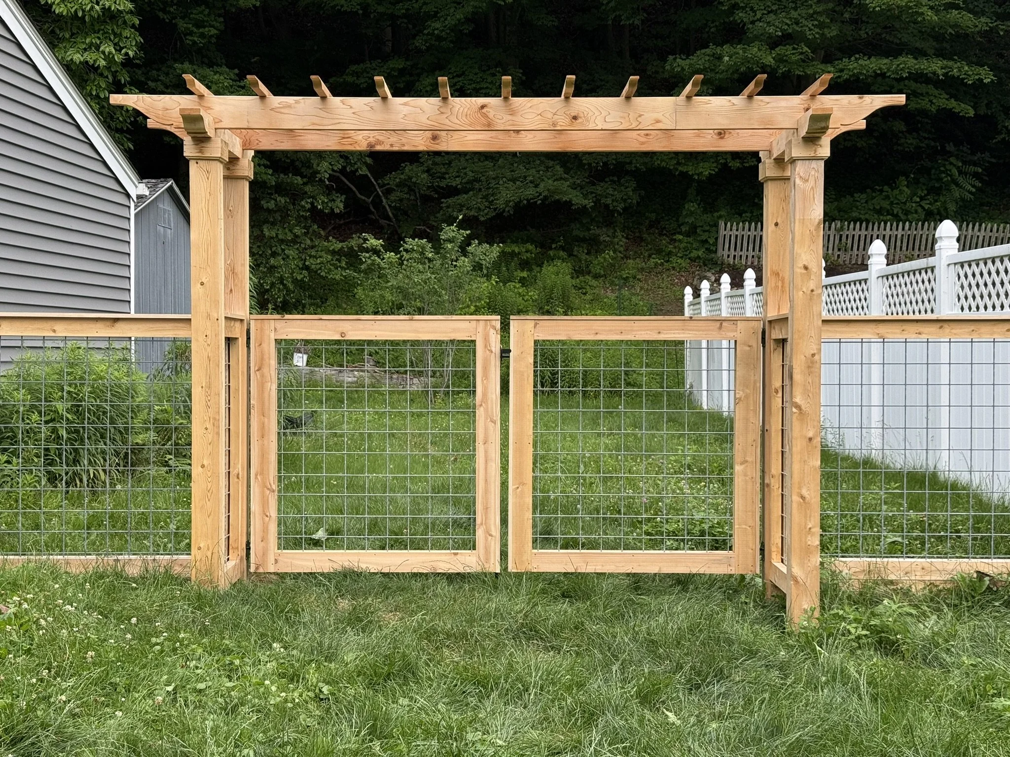 Custom Cedar picture frame gates with cedar pergola topper in Bethel CT