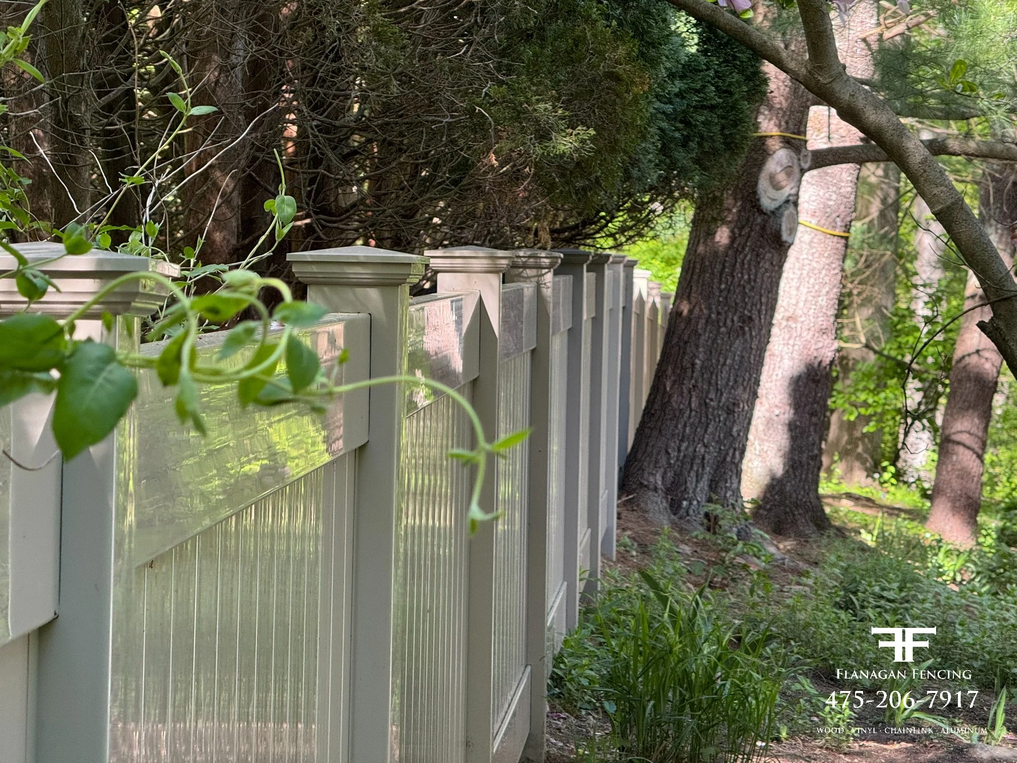 4' Tall Tan vinyl tongue & groove privacy fence in Redding, CT.