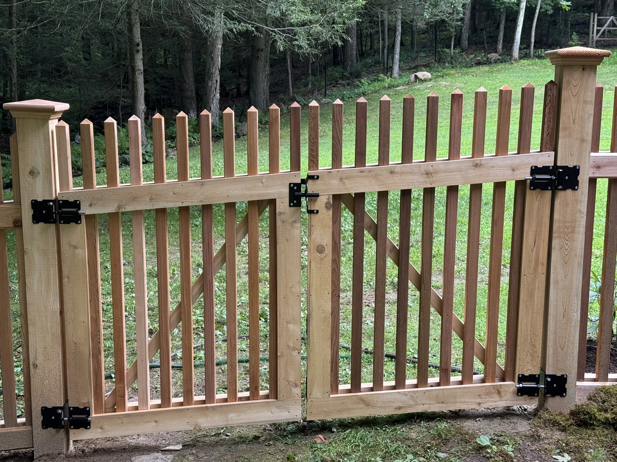 Custom Racked cedar picket gates built to grade in Roxbury CT