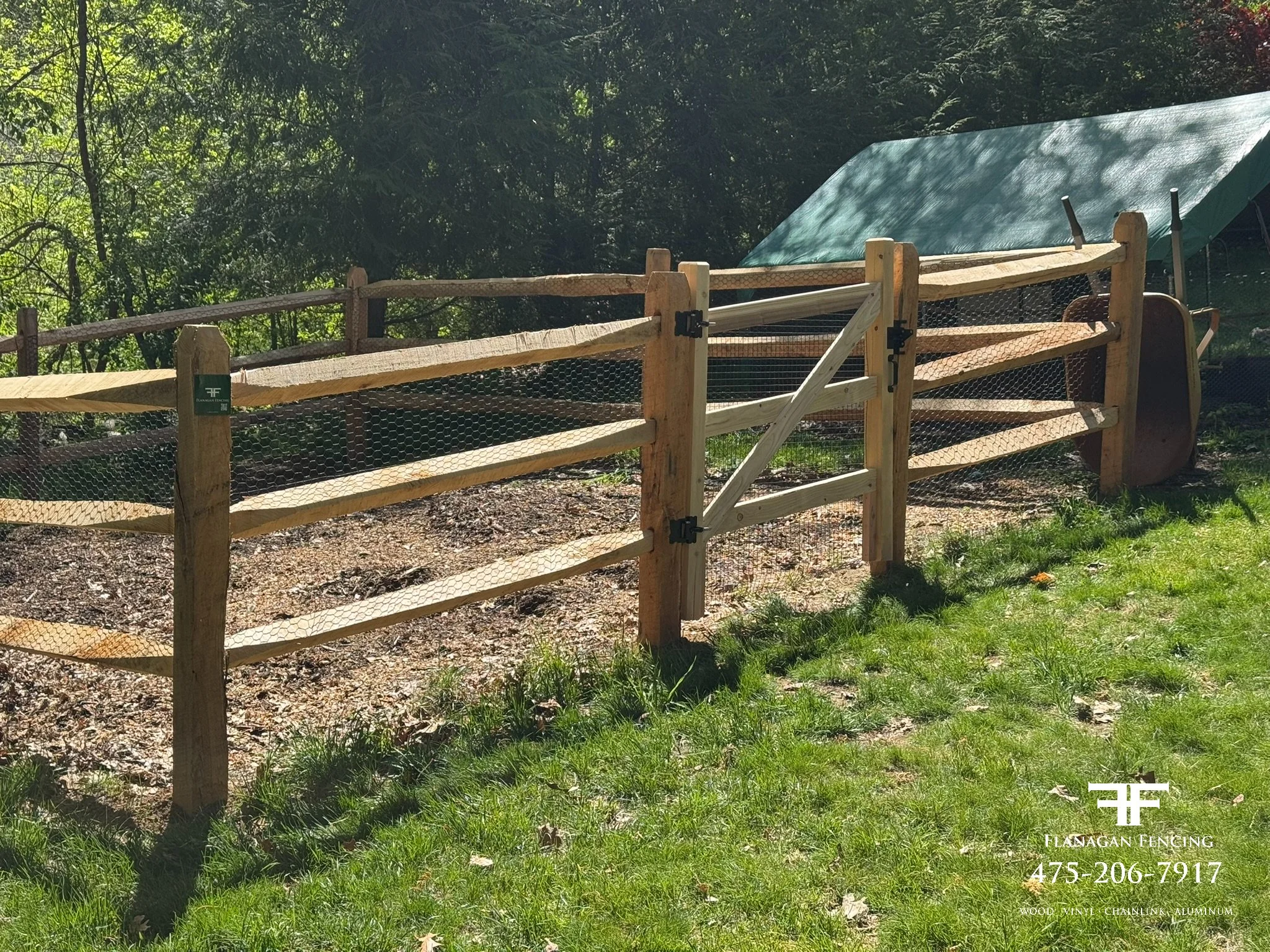 Locust garden enclosure with custom mortise & tenon gate built to grade in Brookfield, CT