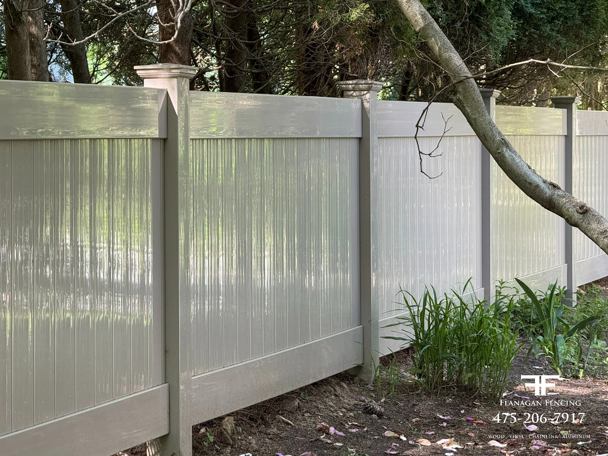 4' Tall Tan vinyl tongue & groove privacy fence in Redding, CT.