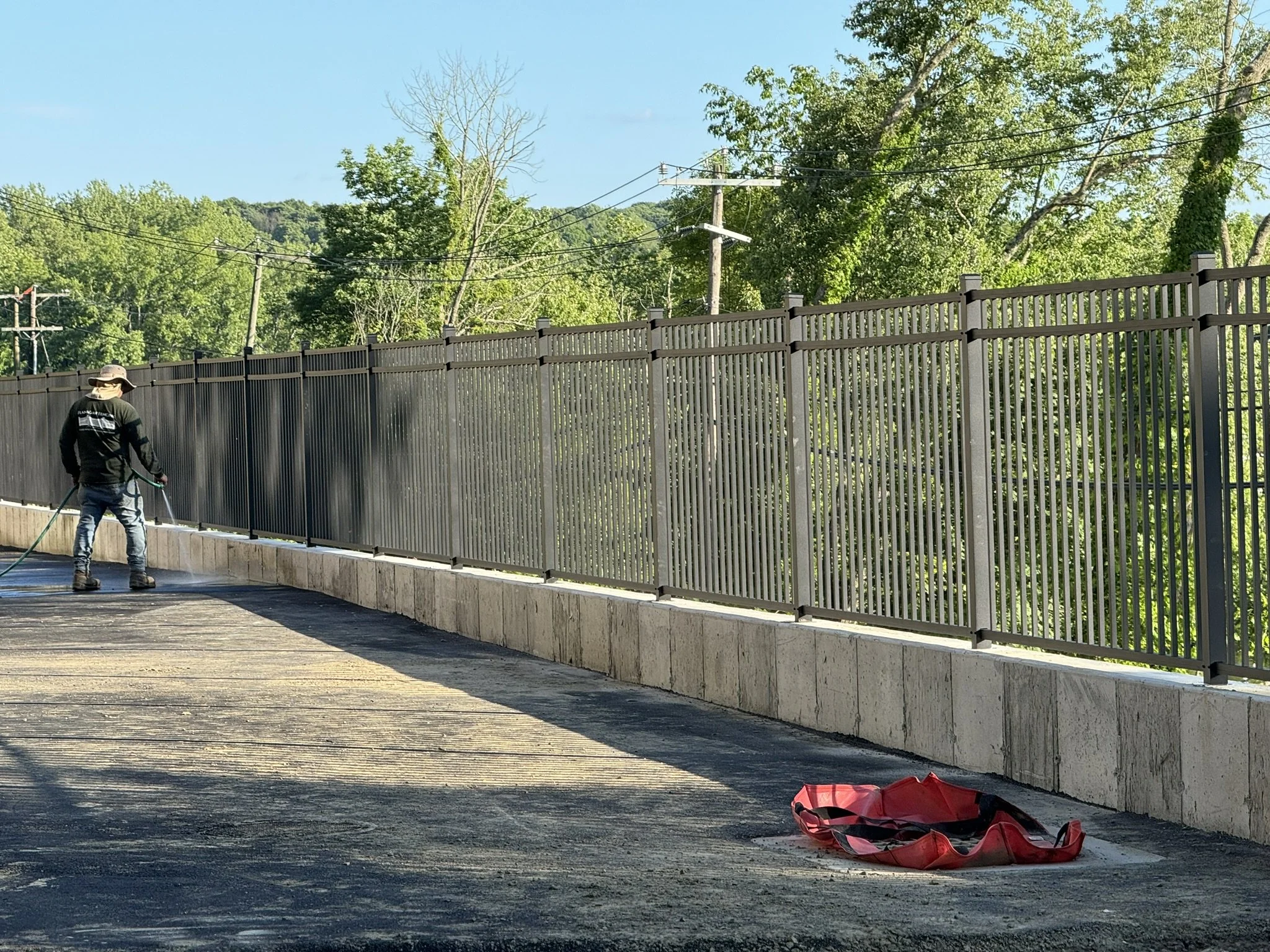 Commercial grade matte black aluminum fence installed in Ridgefield, CT.