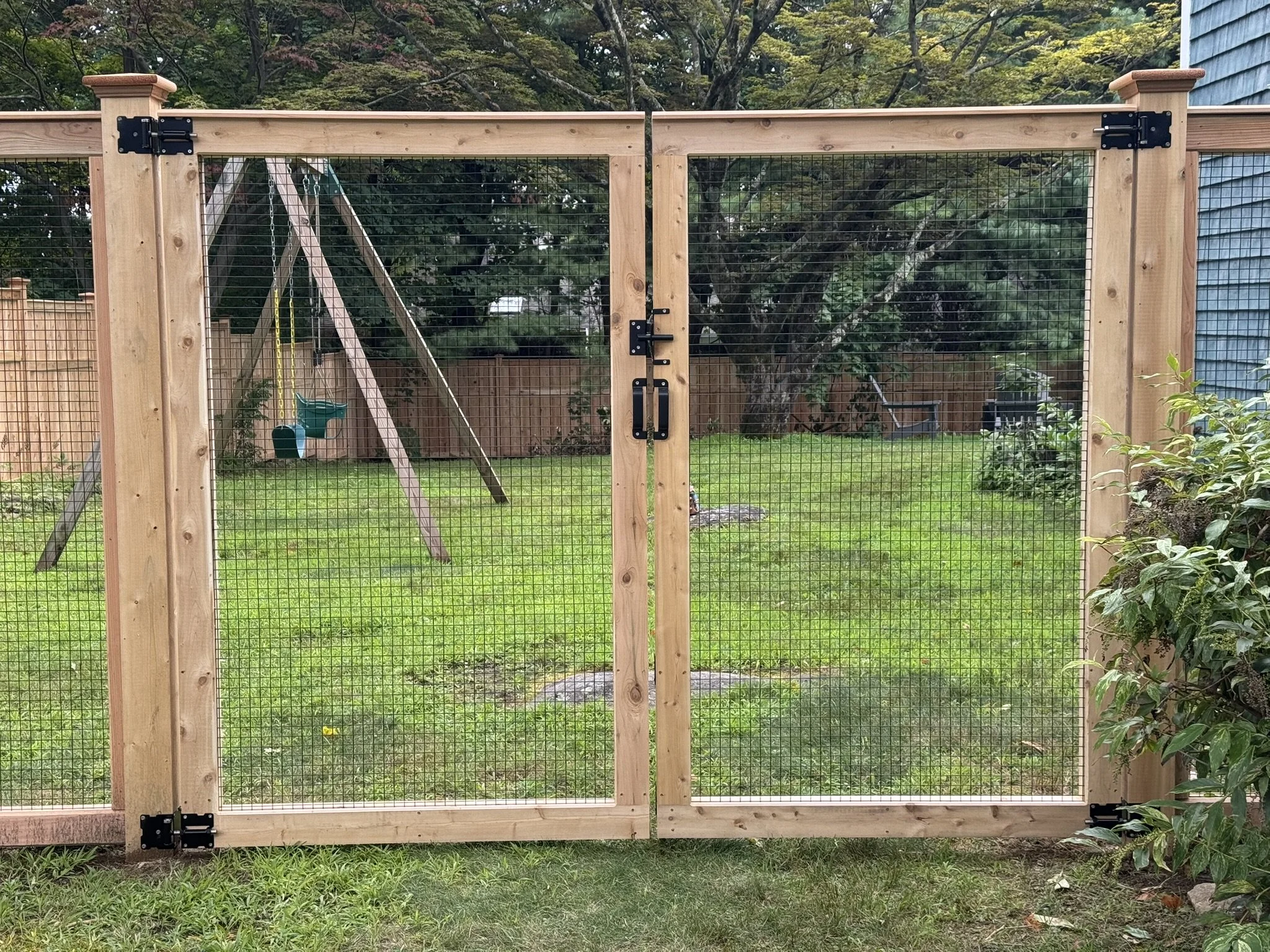 Custom Cedar picture frame gates with welded wire in Danbury CT
