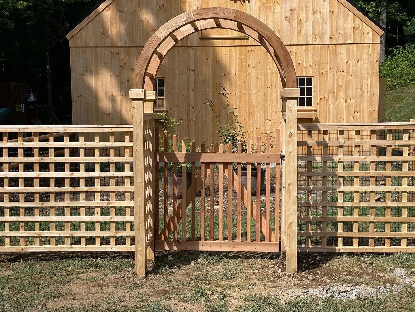 Cedar arbor with cedar picket gate in Redding CT