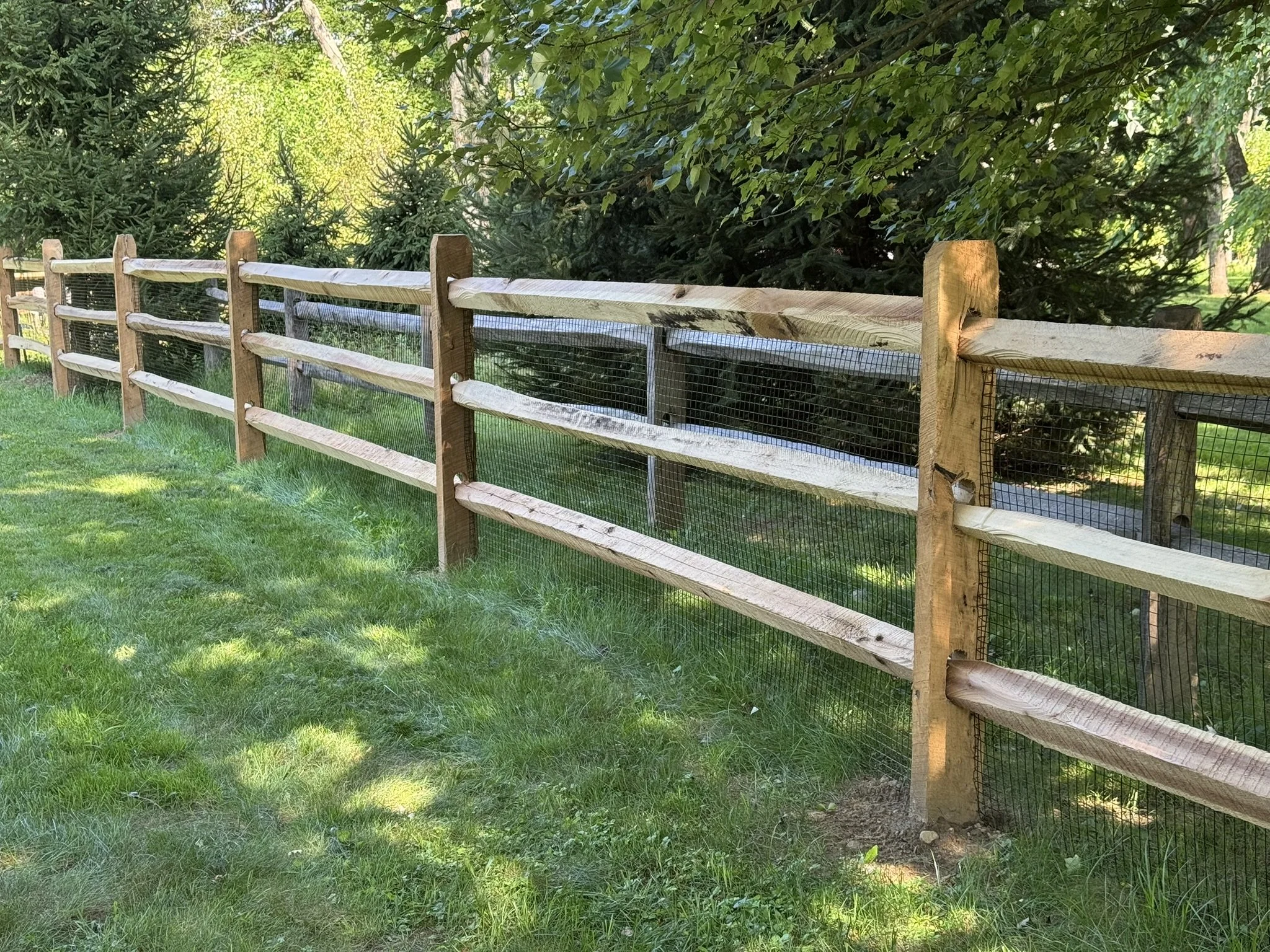 Locust split rail fence in Ridgefield, CT.