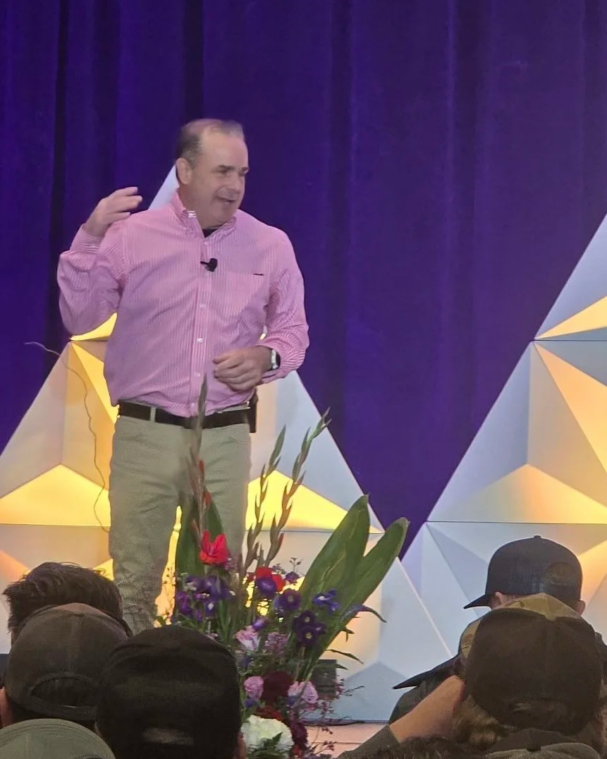 Keith Reester on stage motivational speaking