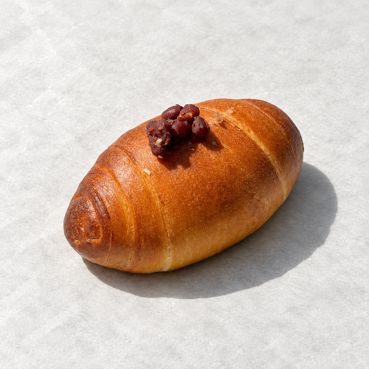 Red bean salt bread on parchment-1.png