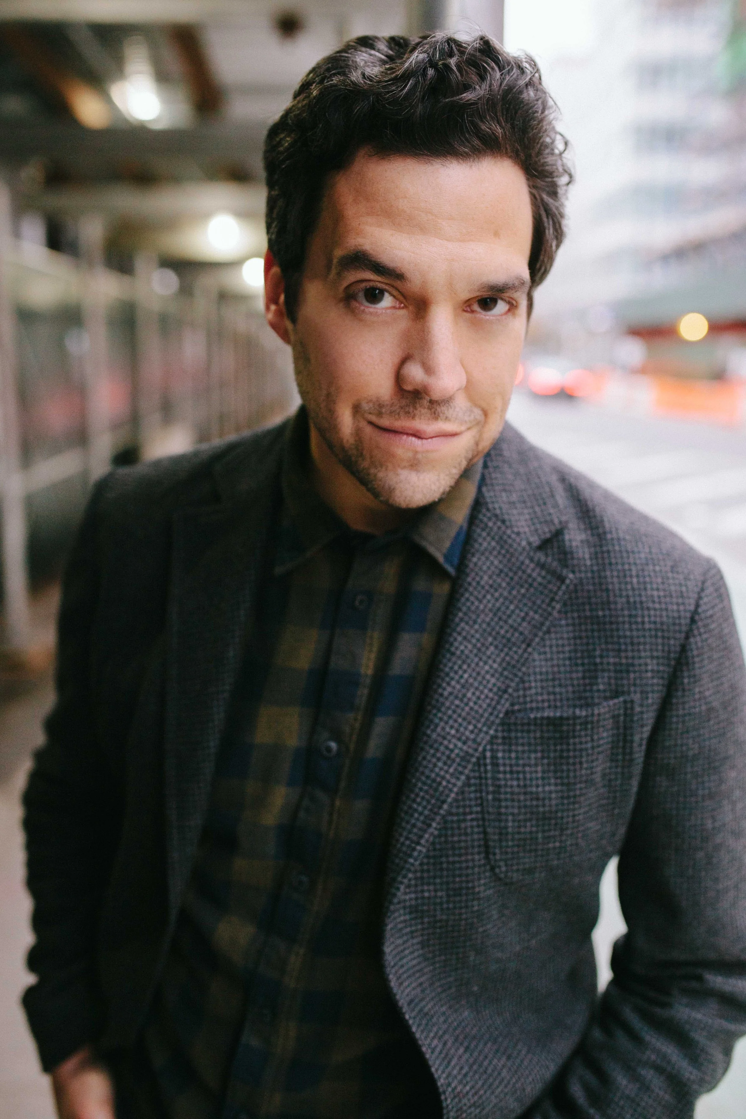 Headshot of NYC-based actor Aaron Serotsky of Marvelous Mrs. Maisel, Ray Donovan, House of Cards, Dopesick, The Good Doctor, Julia. Image taken in Williamsburg on the East River promenade.